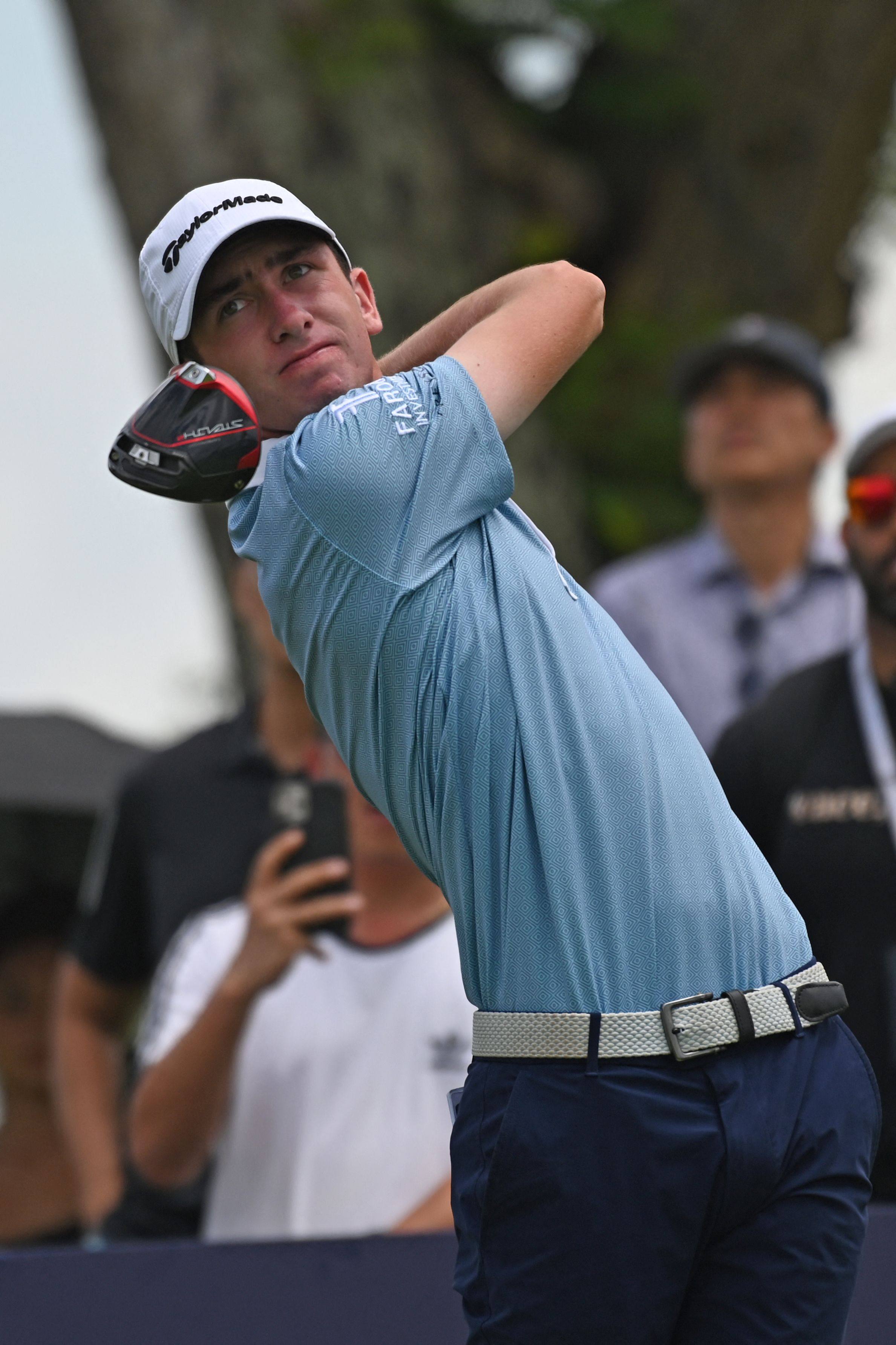 Tom McKibbin tees off during the second round of the DP World Tour’s Singapore Classic. Photo: AFP