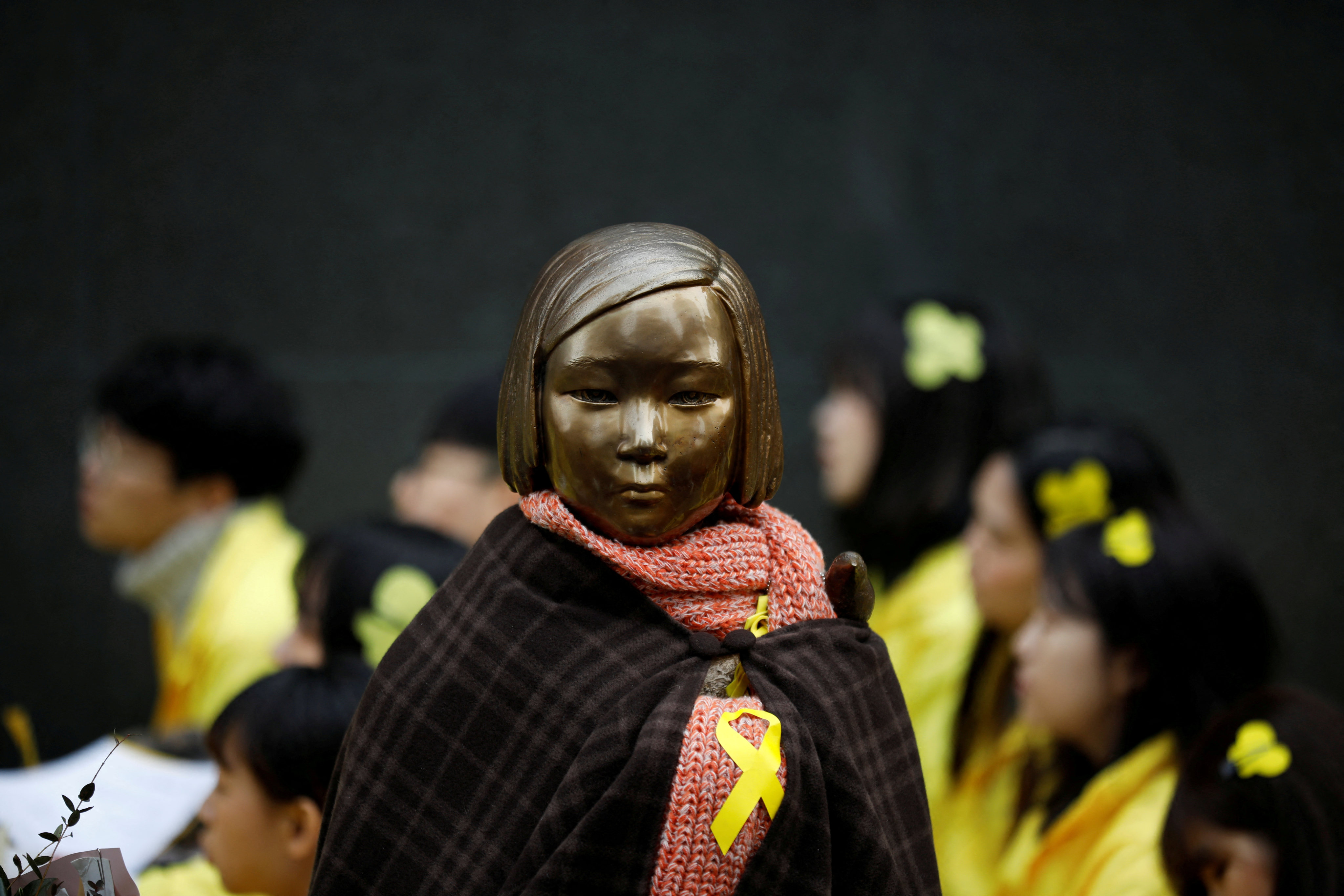 Korea court convicts 'comfort women' activist of embezzling donat...