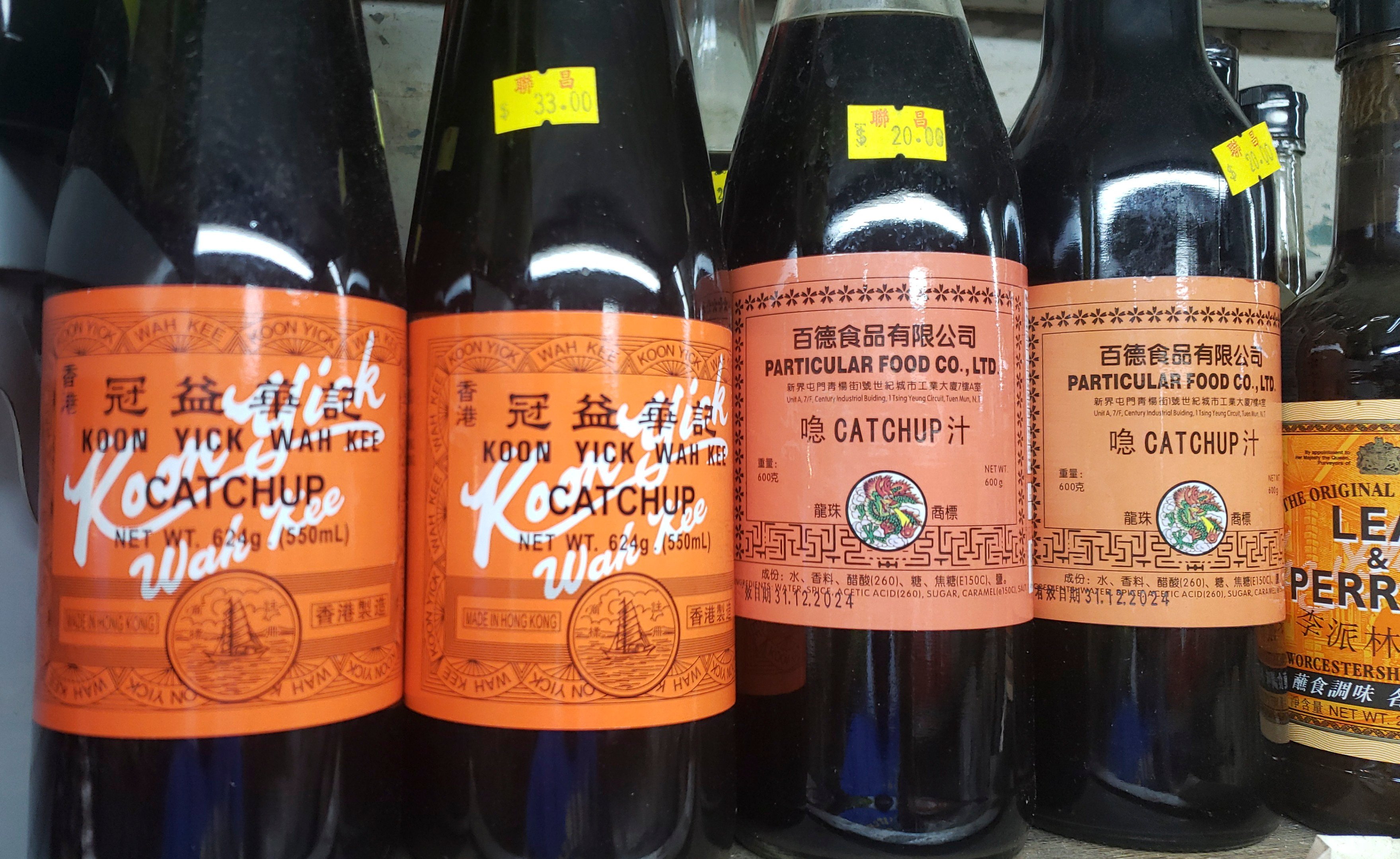 Hong Kong-style variants of foreign foodstuffs are readily recognisable, quirkily distinctive features of local life. Koon Yick Wah Kee’s Catchup (left) and Particular Food Co. Ltd’s Catchup on sale in a shop. Photo: Jason Wordie