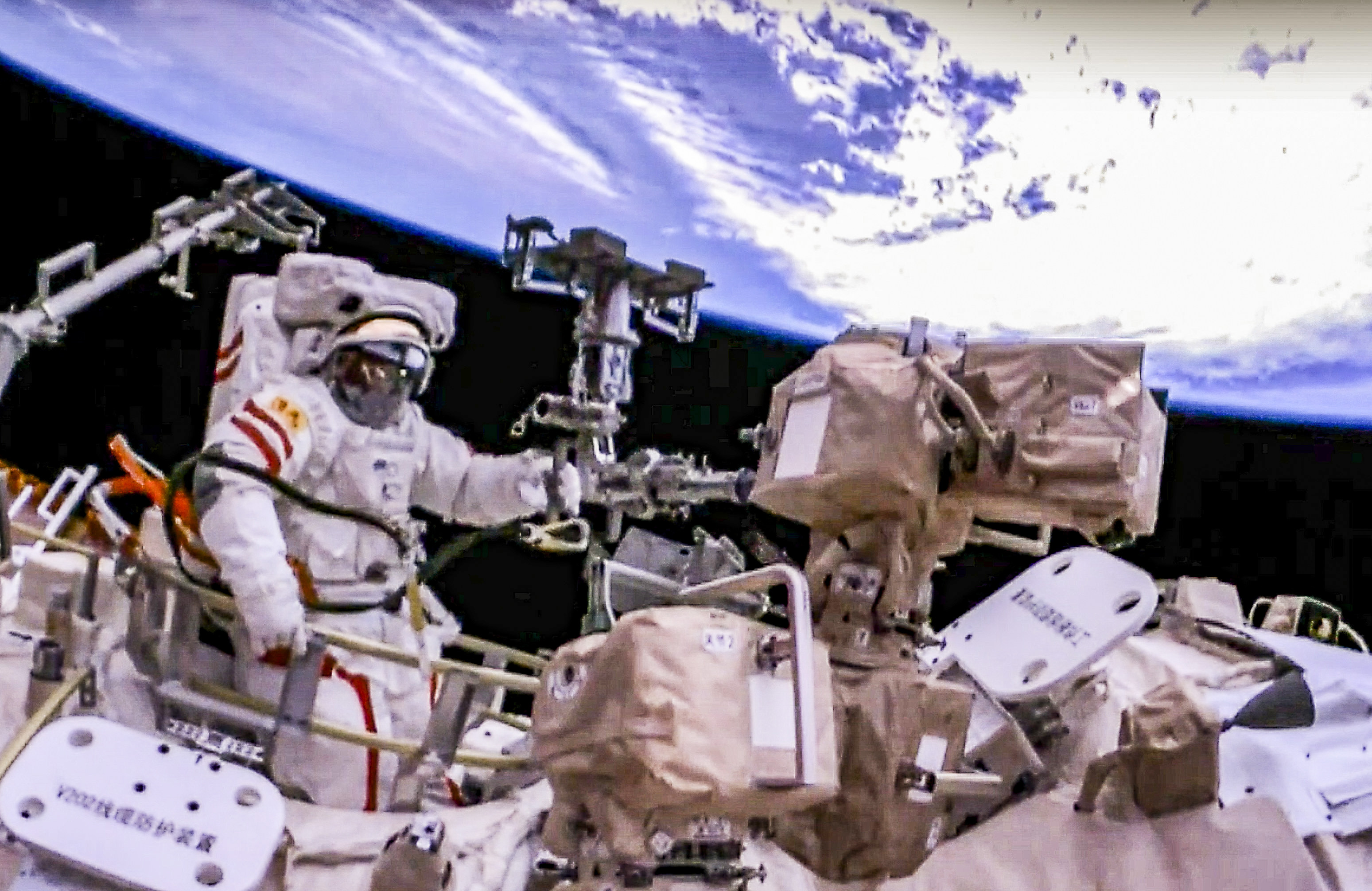 Astronaut Fei Junlong takes a space walk from the Tiangong space station on February 9.
Photo: CCTV