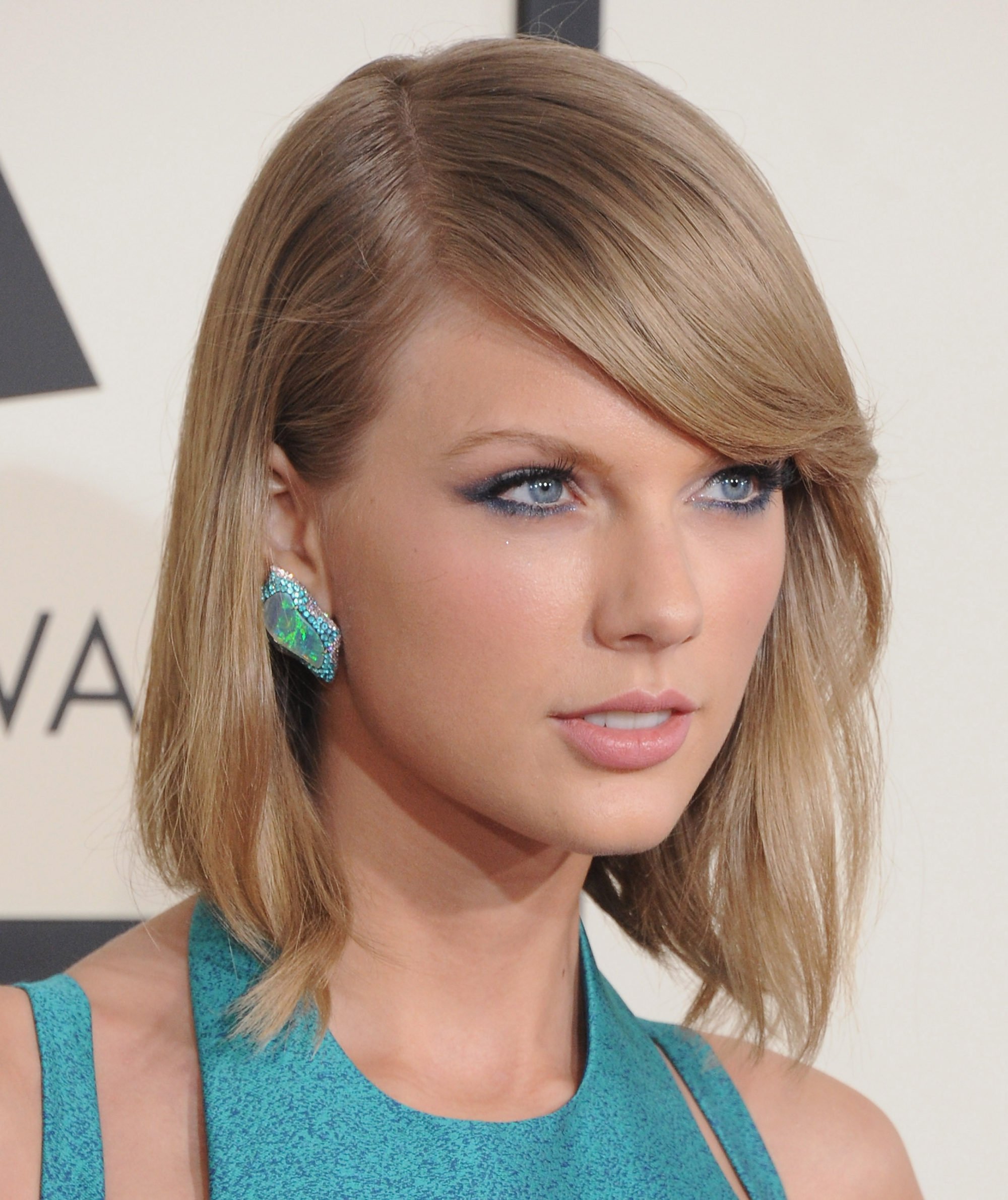 Taylor Swift in striking blue-green jewellery at the 57th Grammy Awards in 2015 in LA. Photo: FilmMagic