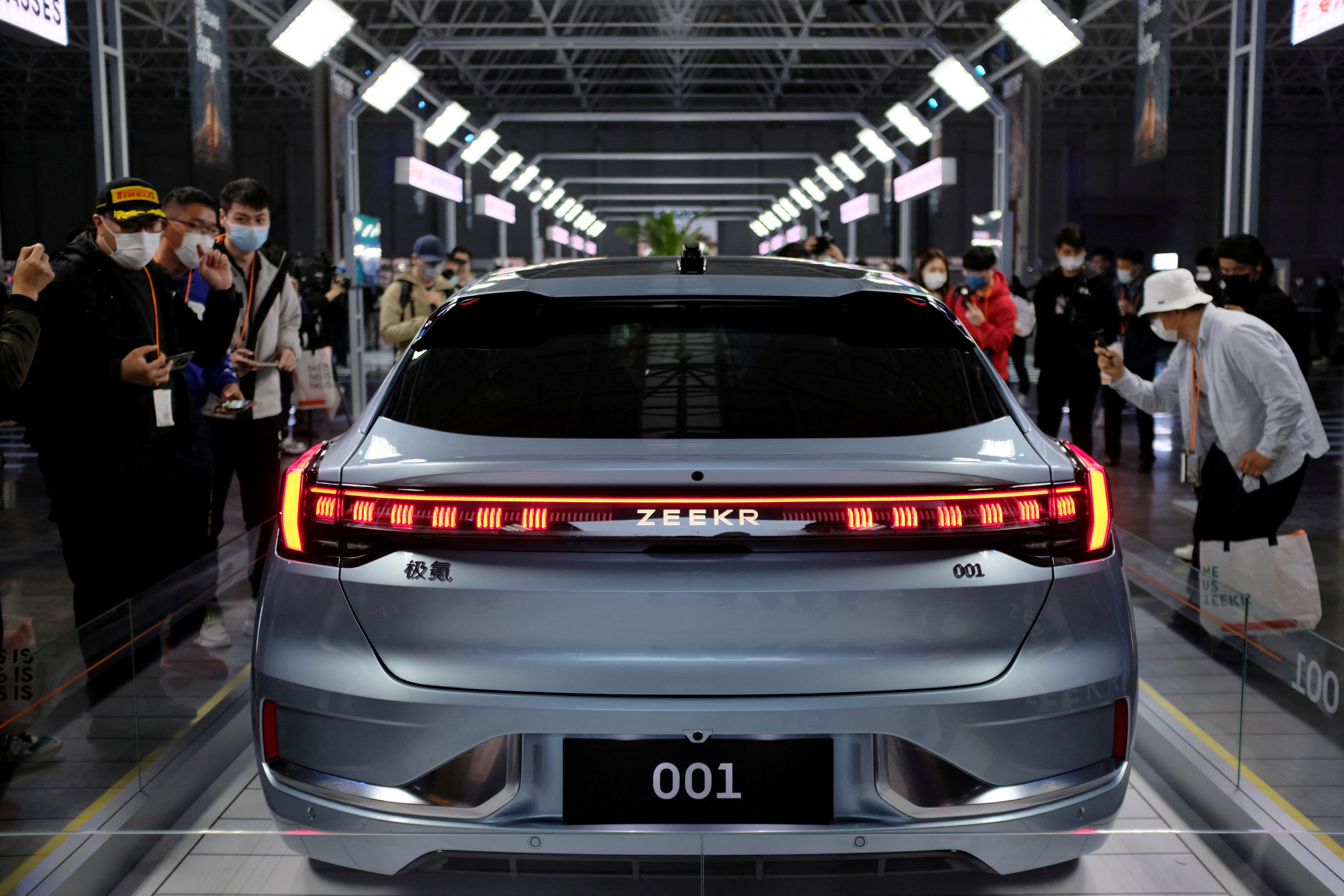 Visitors check out a Zeekr 001 at Zeekr’s factory in Ningbo, Zhejiang province, China on April 15, 2021. Photo: Reuters
