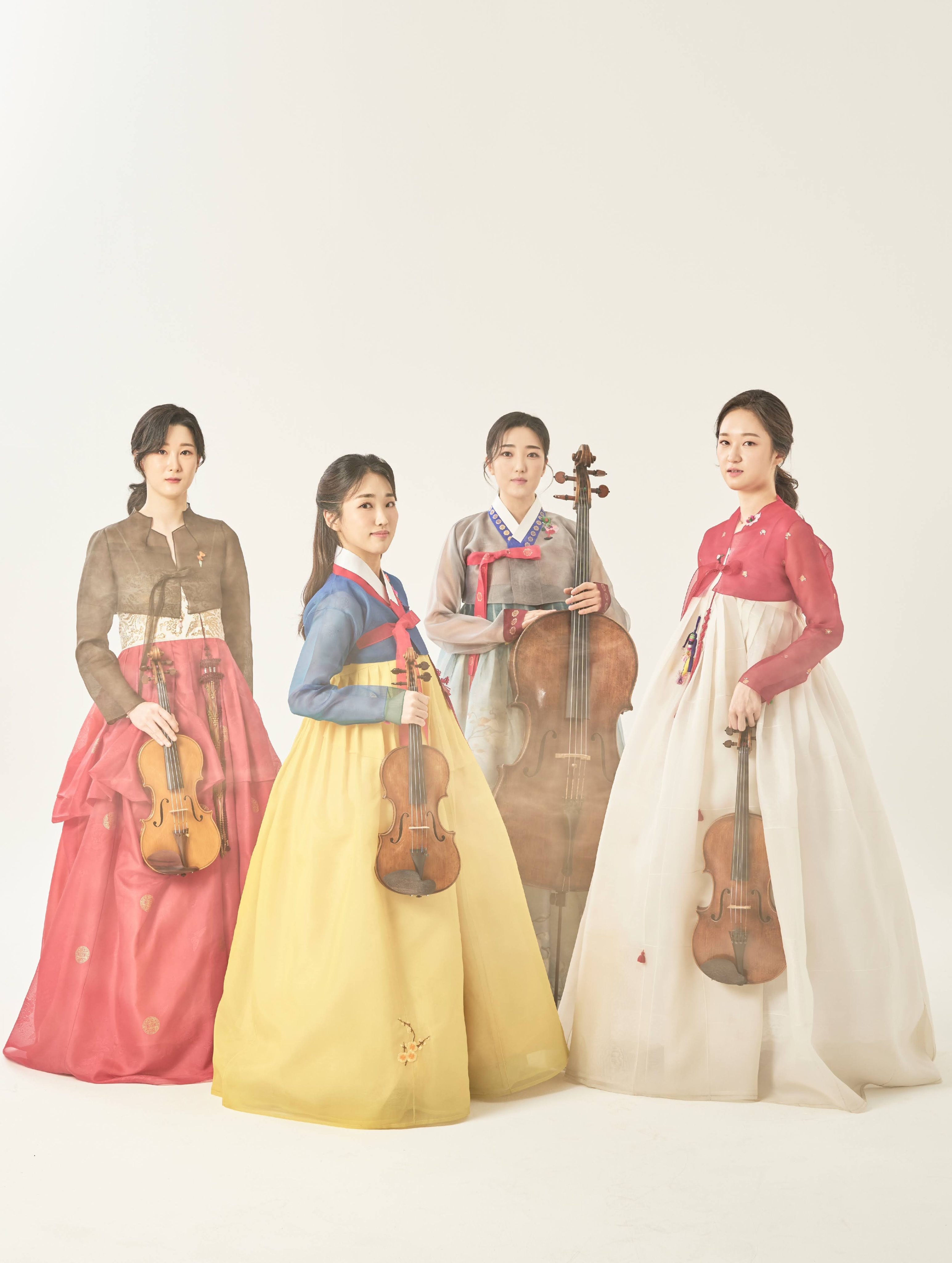 Posed in traditional Korean dress, the Esmé Quartet, comprising four women musicians from South Korea, will make their Hong Kong debut with a string quartet recital on February 28 as part of the 2023 Hong Kong Arts Festival. Photo: Piljoo Hwang