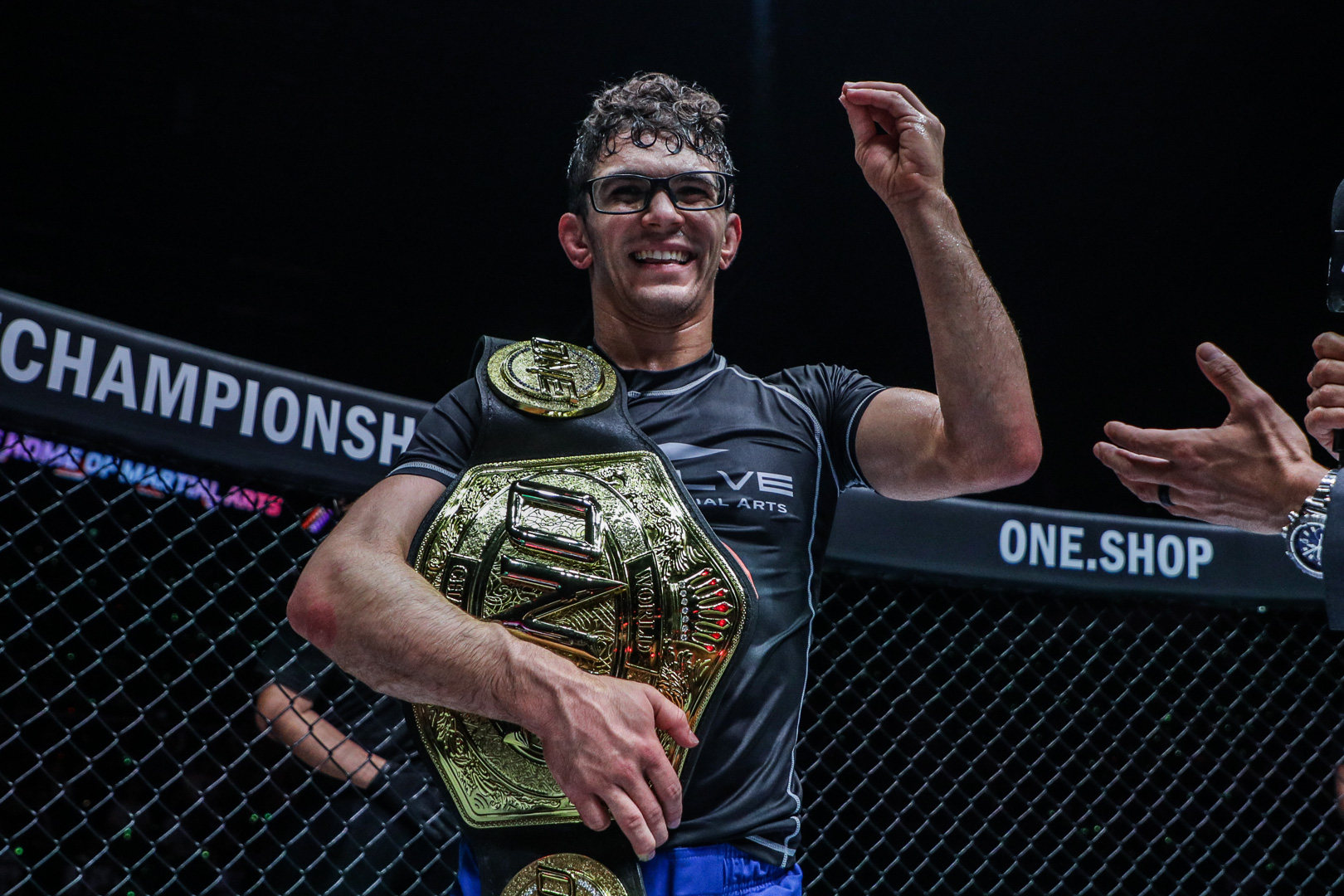 Mikey Musumeci celebrates after winning the ONE flyweight submission grappling title with a decision defeat of Cleber Sousa.