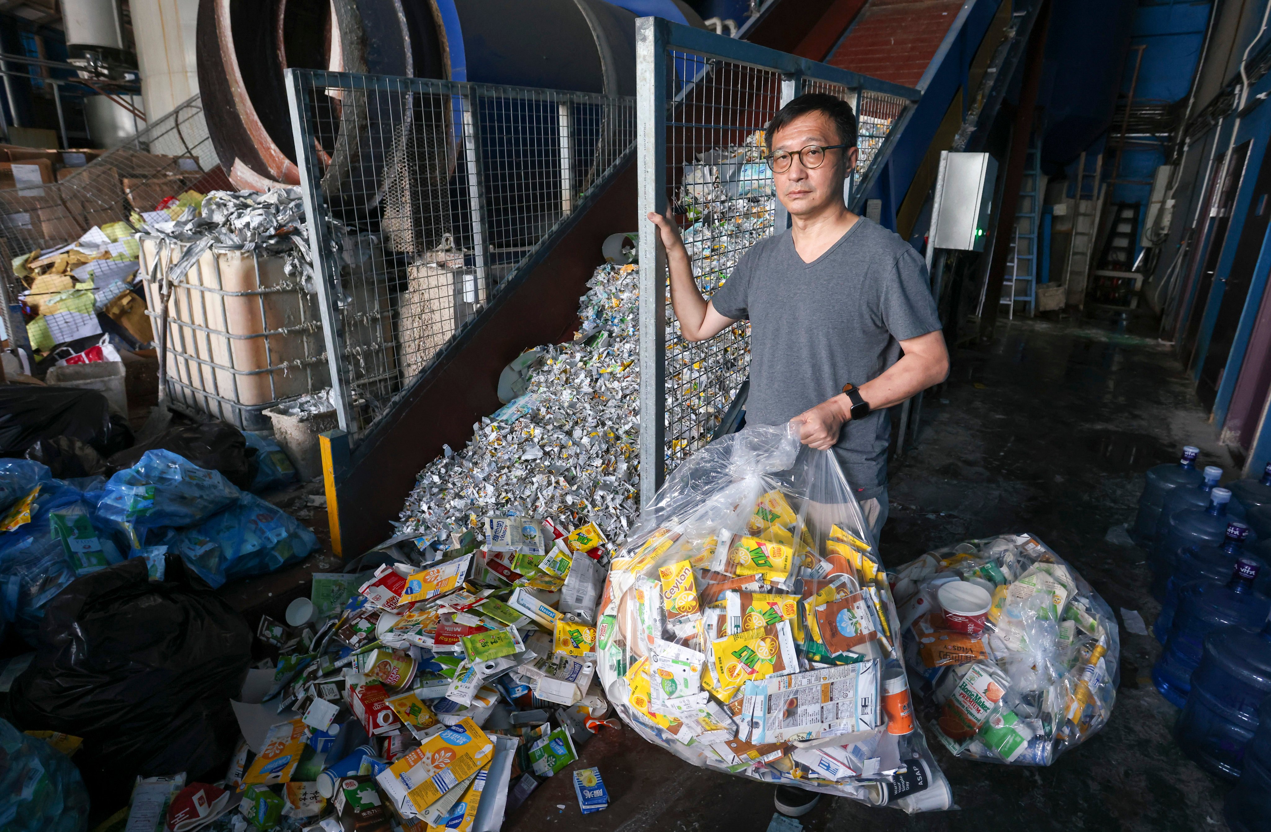 Mil Mill executive director Harold Yip at the beverage carton recycling plant in Yuen Long Industrial Estate. Photo: Jonathan Wong