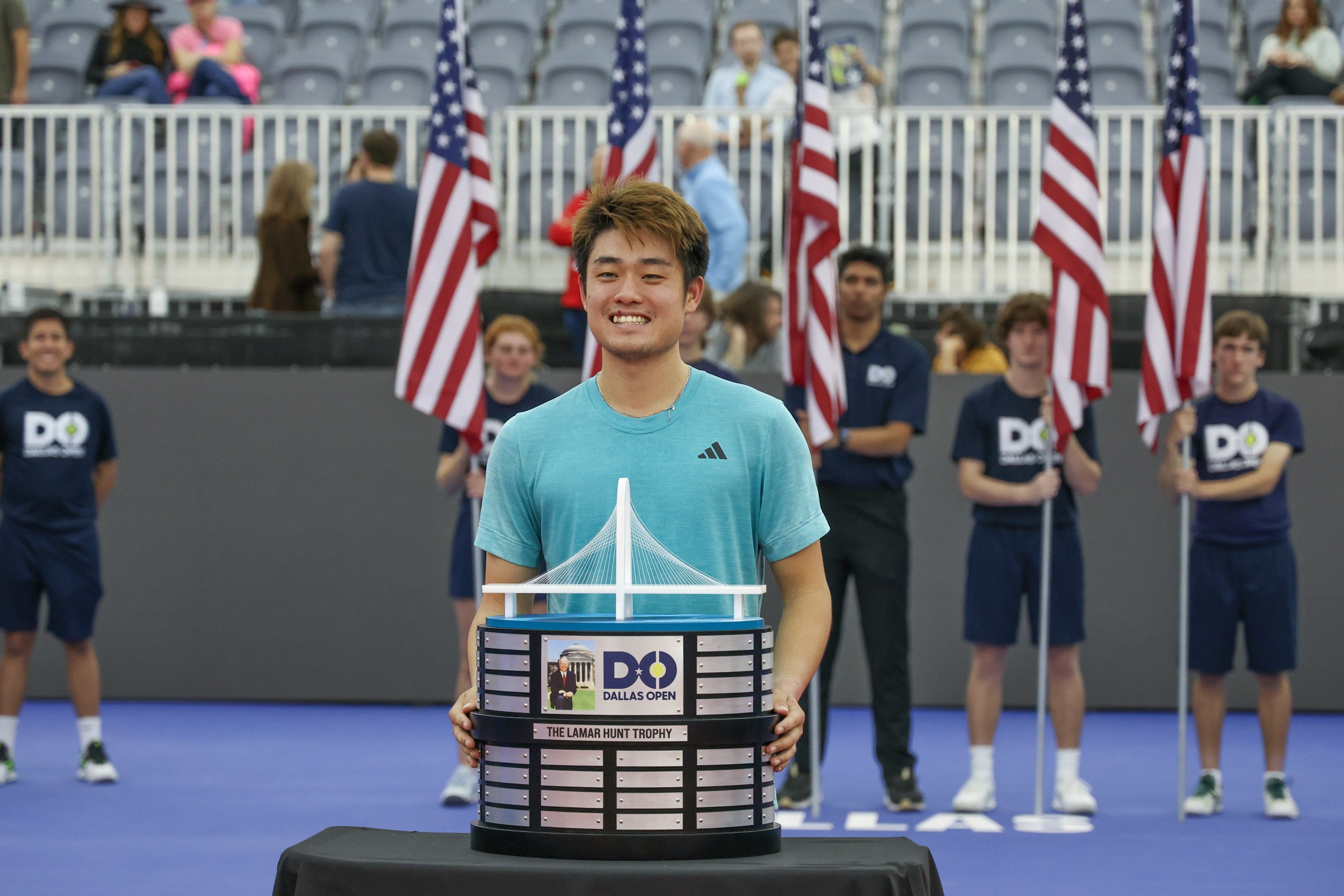 Wu Yibing poses with the Lamar Hunt Trophy after winning the Dallas Open on February 12, 2023. Photo: Getty Images