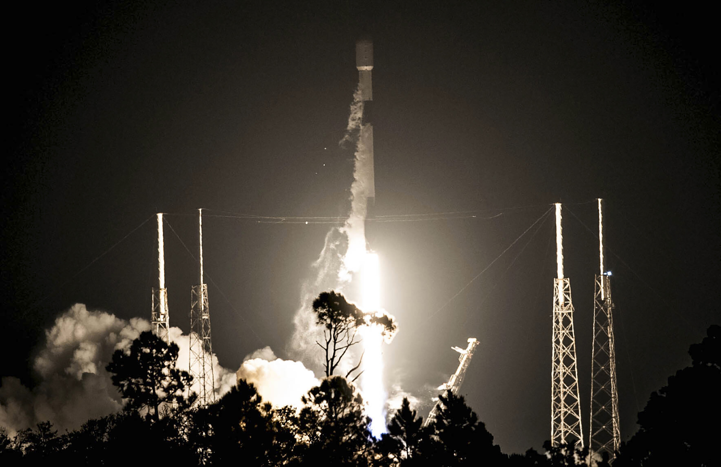 A SpaceX Falcon 9 rocket lifts off from Cape Canaveral Space Force Station in Florida on February 12, 2023. In a new mission scheduled for June, a Falcon 9 rocket will carry cargo that includes NFT artworks etched onto nano fiche disks to be part of the Lunaprise Moon Museum. Photo: AP