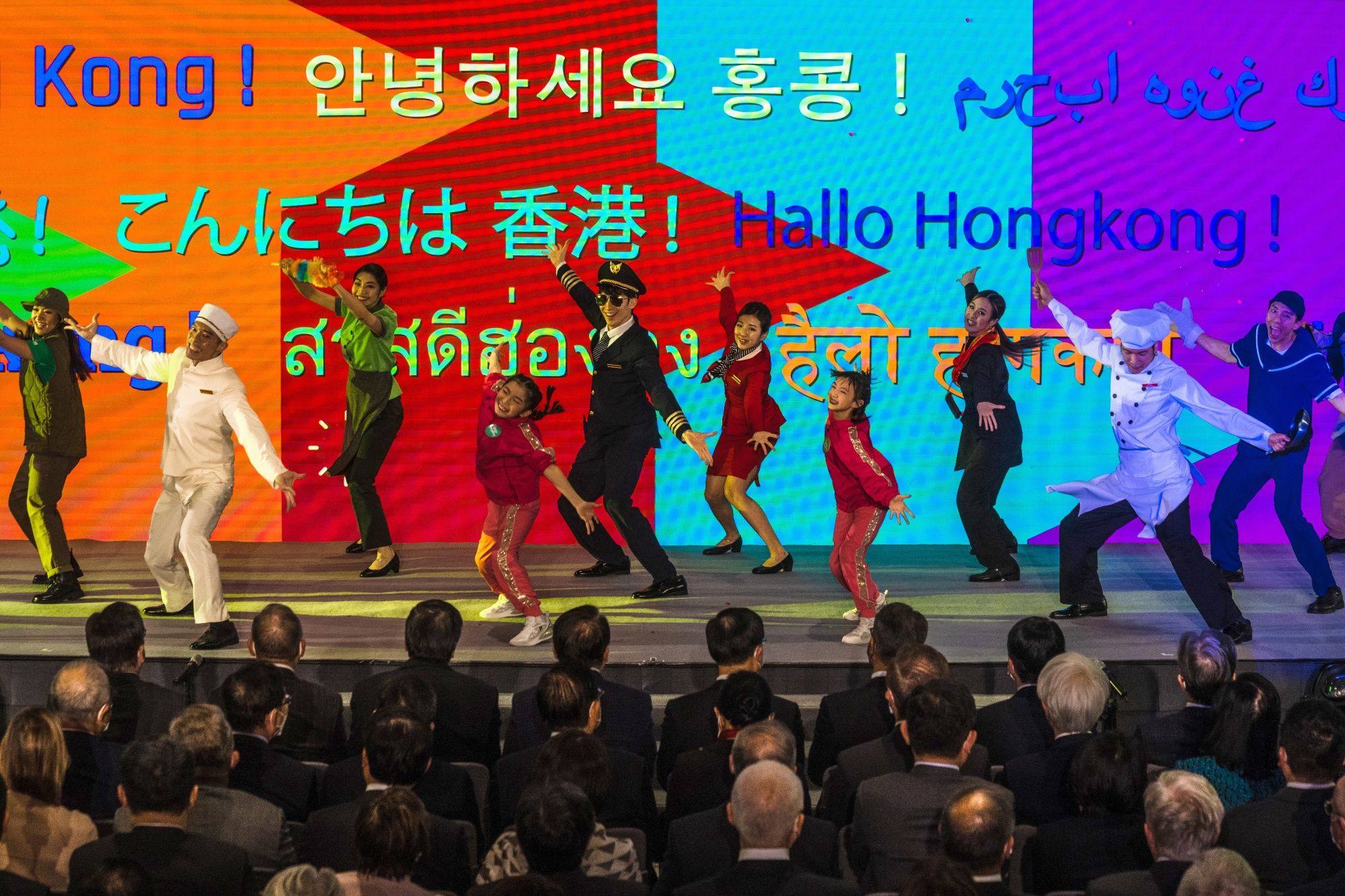Performers dance during the “Hello Hong Kong” campaign launch ceremony on February 2. Hong Kong will hand out 500,000 air tickets to bring in much-needed visitors as part of a global publicity campaign. Photo: Bloomberg