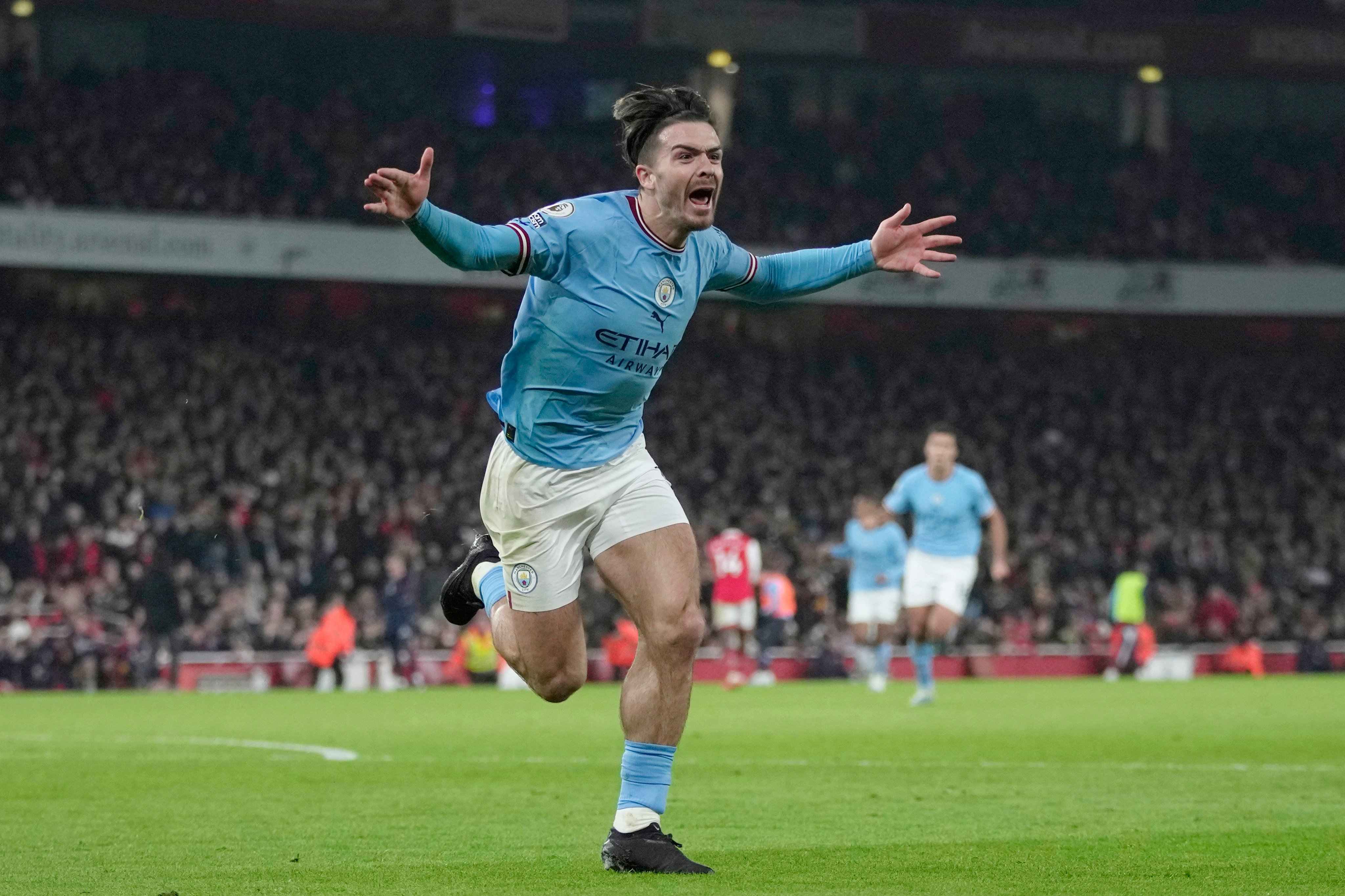 Manchester City’s Jack Grealish celebrates after scoring his side’s second goal against Arsenal. Photo: AP