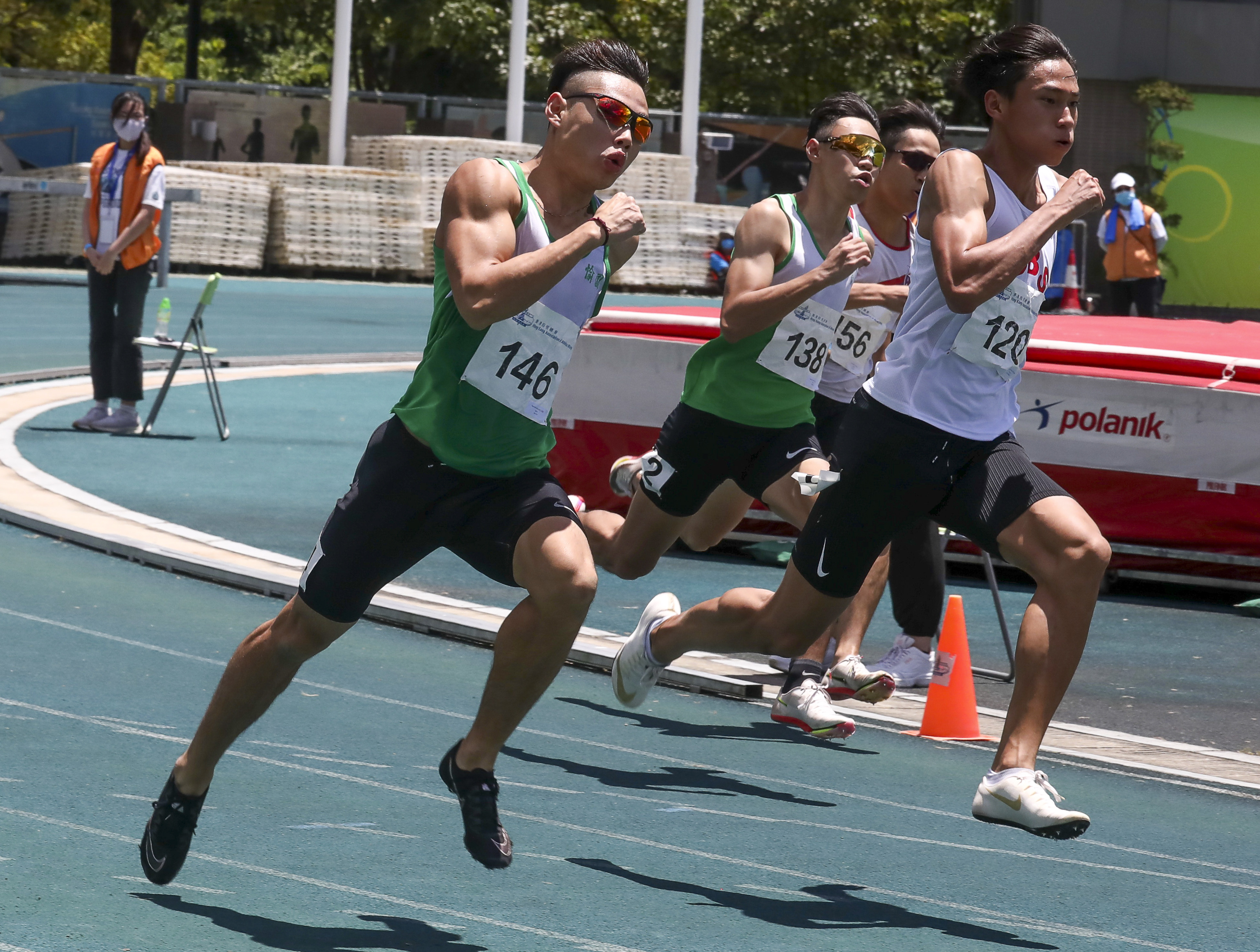 Shak Kam-ching (left) competing during the men’s 200m race at the Hong Kong Athletics Championships at Tseung Kwan O Sports Ground. Photo: Jonathan Wong