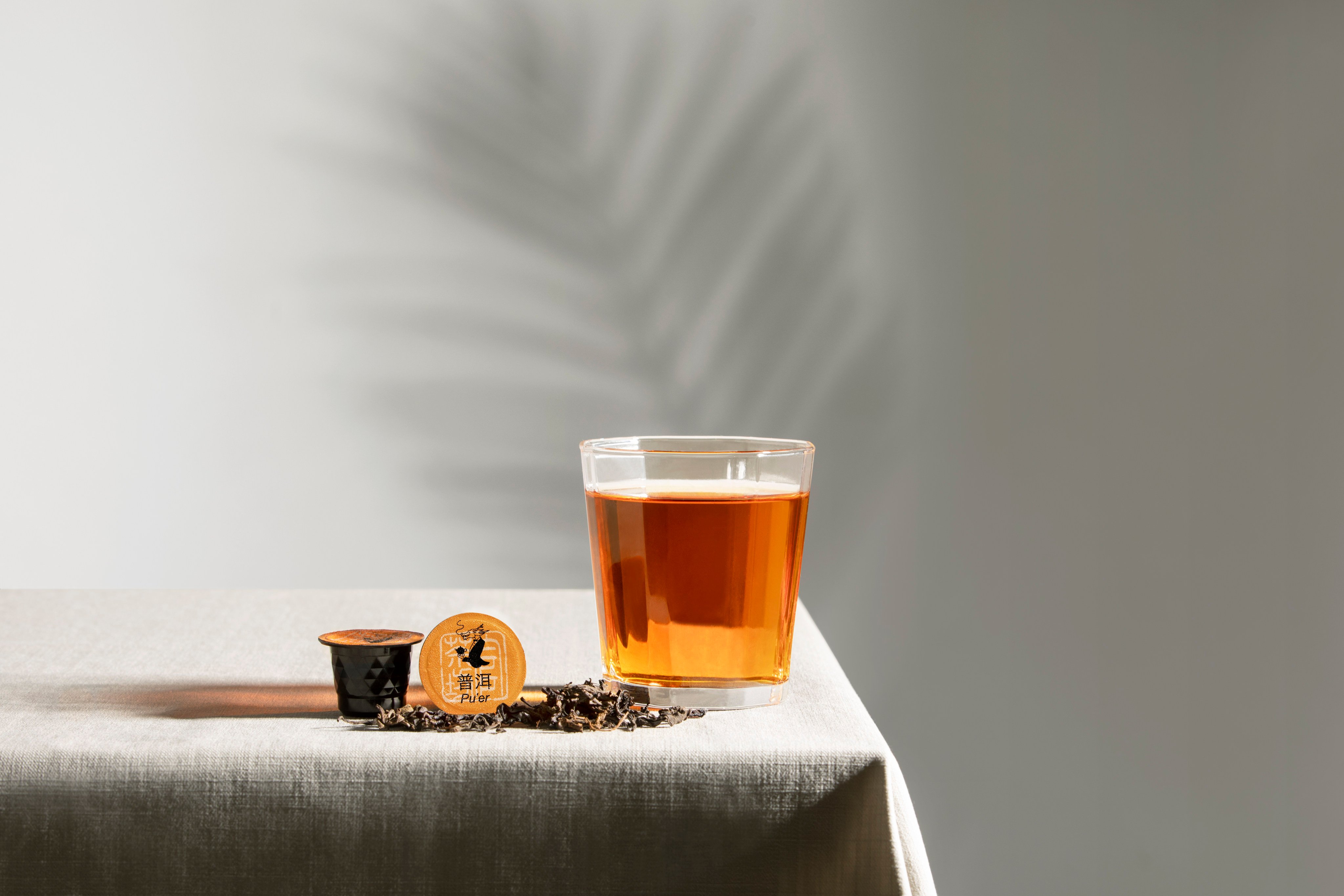 Tea Chateau’s Pu’er capsule and tea. Tea sellers in Hong Kong are reinventing the drink, seen as a gateway to Chinese culture. Photo: Tea Château