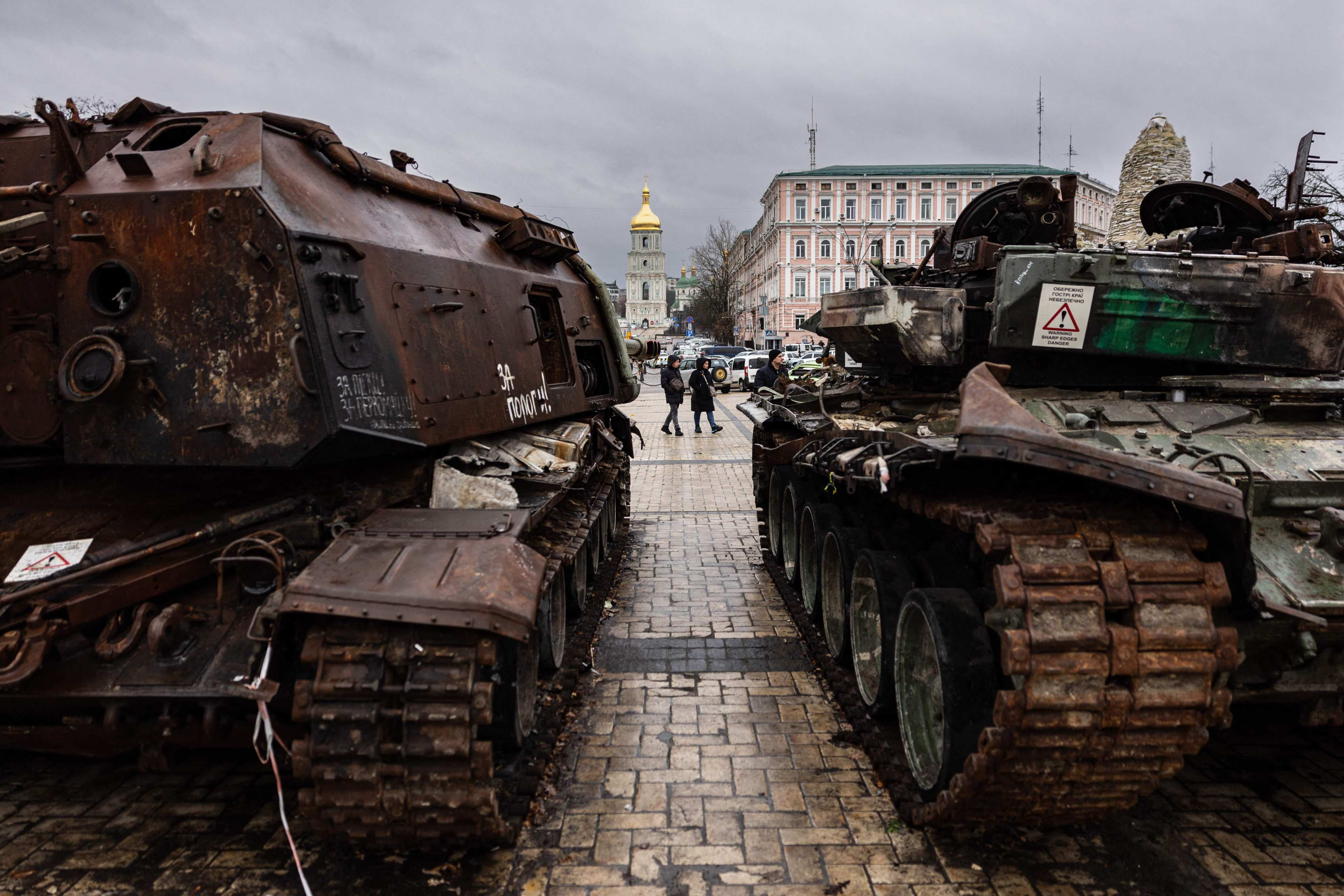 Pedestrians look at the destroyed Russian military vehicles at an open air exhibition of destroyed Russian equipment in Kyiv, Ukraine, on January 5. Photo: AFP