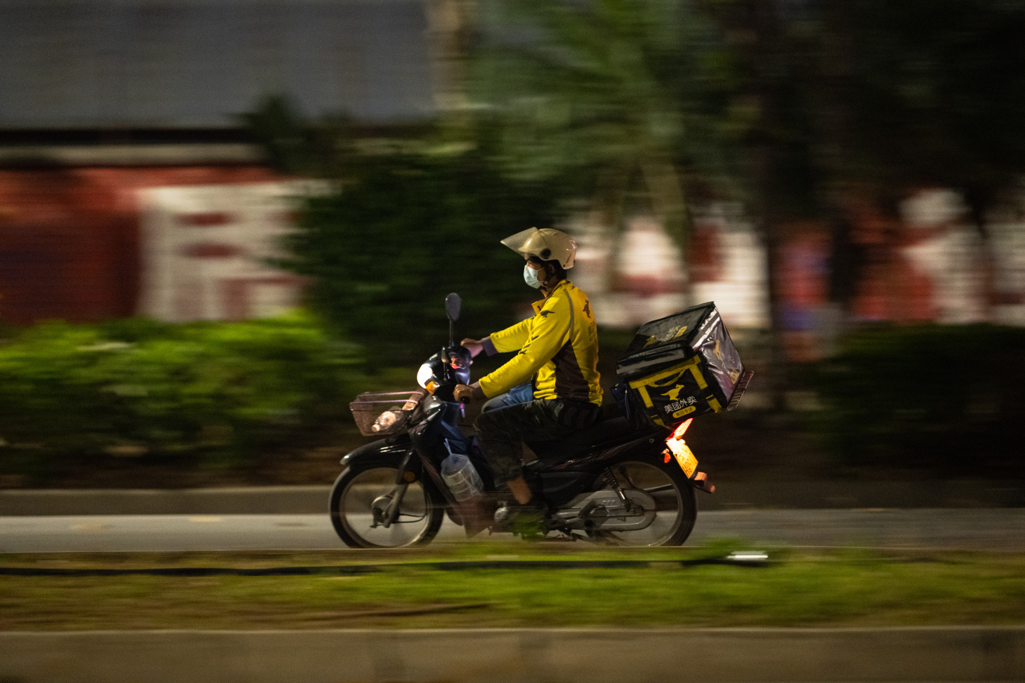 There are millions of food delivery workers in China and one with a sharp mind has helped the authorities bust a major drug gang. Photo: Getty Images