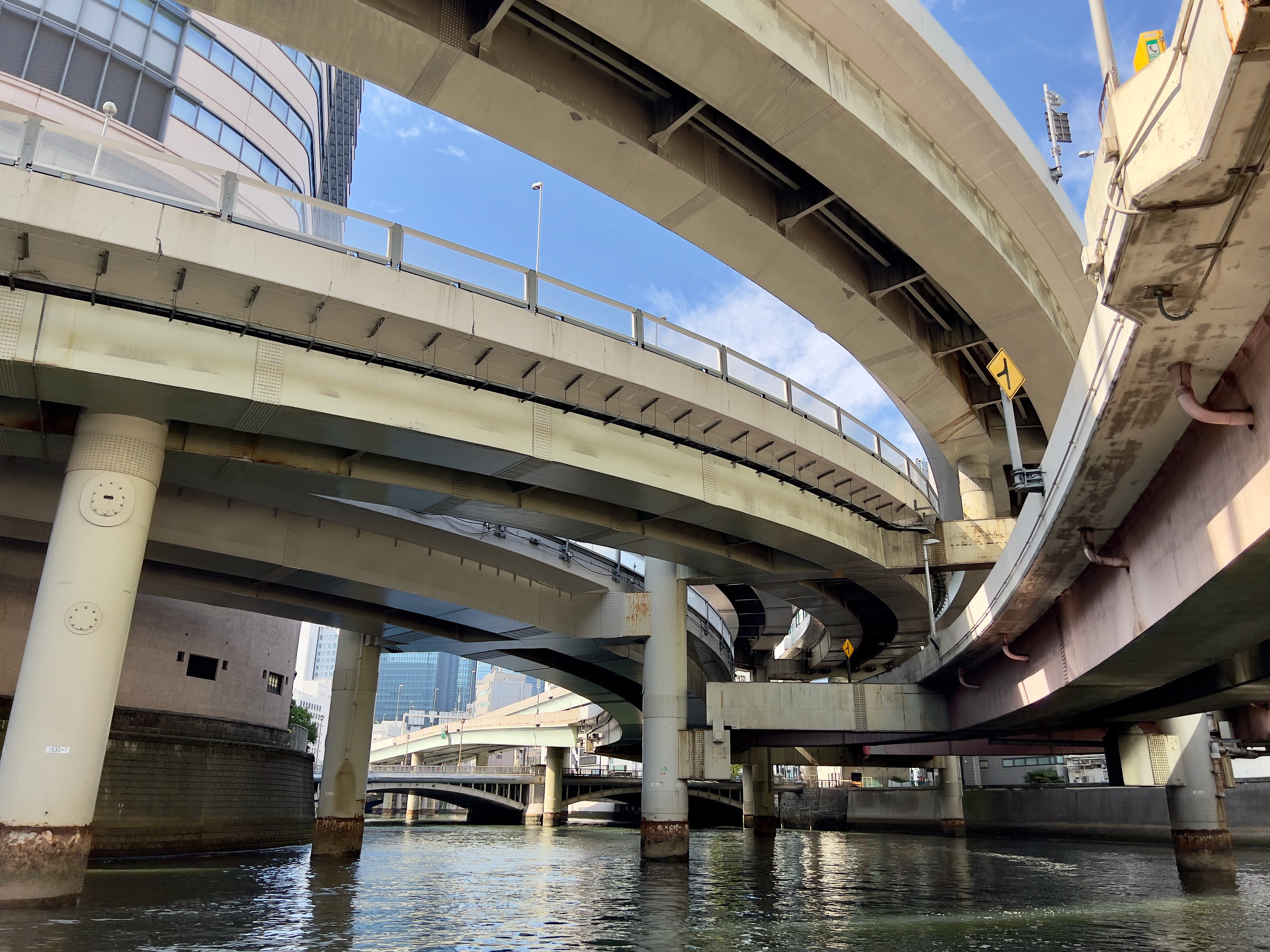 A cruise on the Nihonbashi River in Tokyo shows the extent of highway construction in the 1960s - engineers chose to run expressways above rivers because it was easy to do. Photo: Peter Neville-Hadley