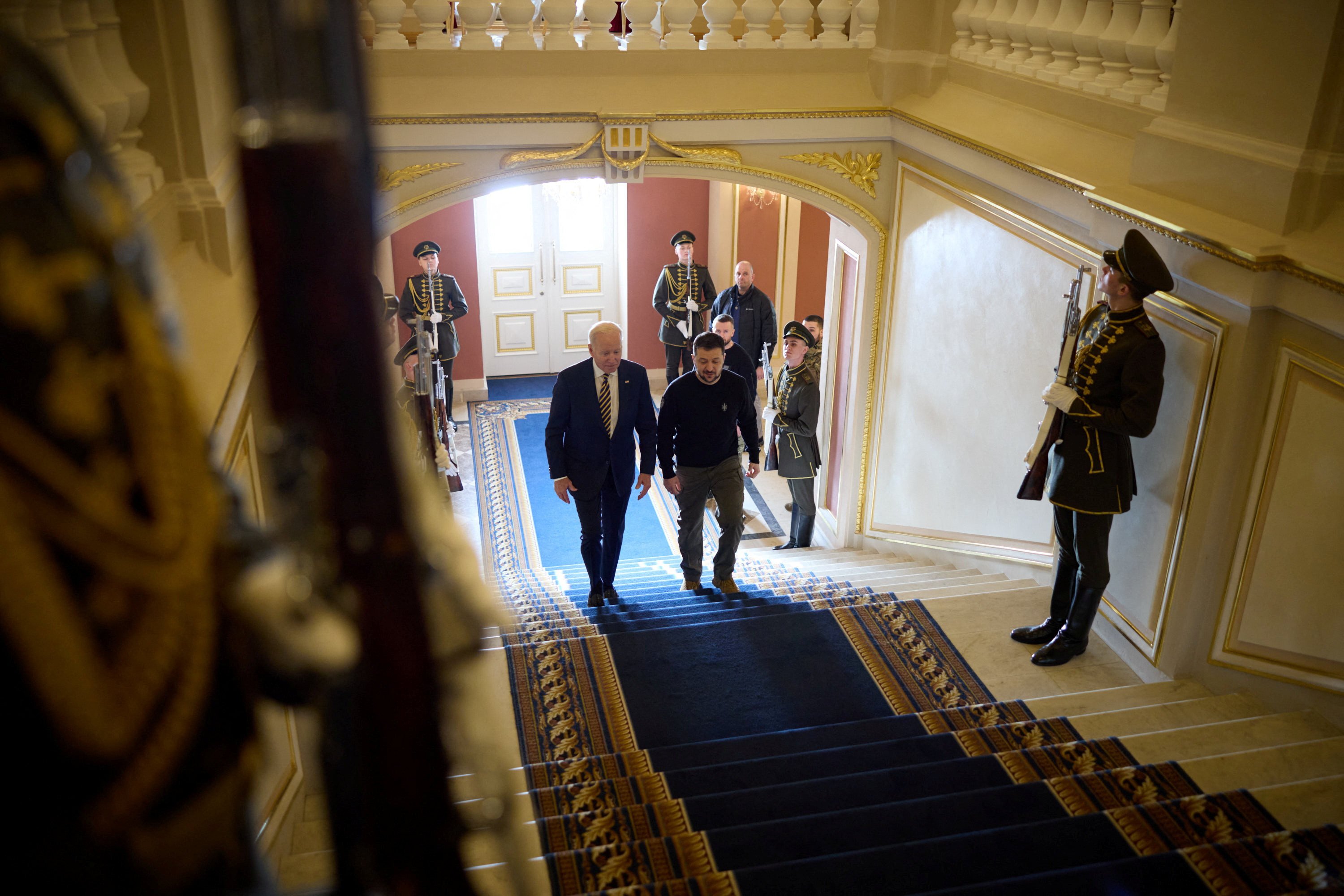 Ukraine’s President Volodymyr Zelensky and US President Joe Biden walk inside the Mariinskyi Palace in Kyiv, Ukraine. Photo: Ukrainian Presidential Press Service/Handout via Reuters