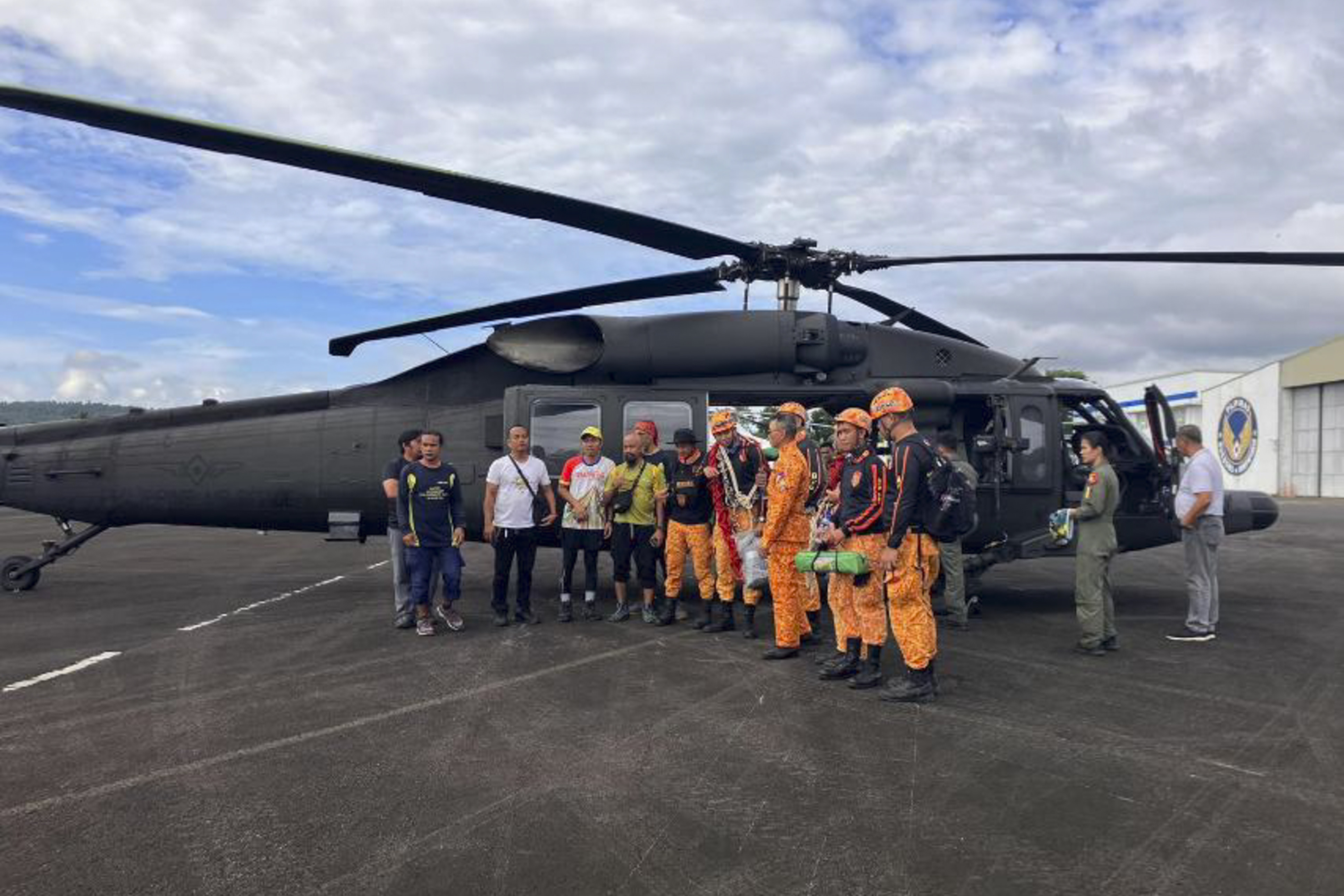 The rescue team that found the wreckage of a small plane carrying two Filipino pilots and two Australian passengers. Photo: AP