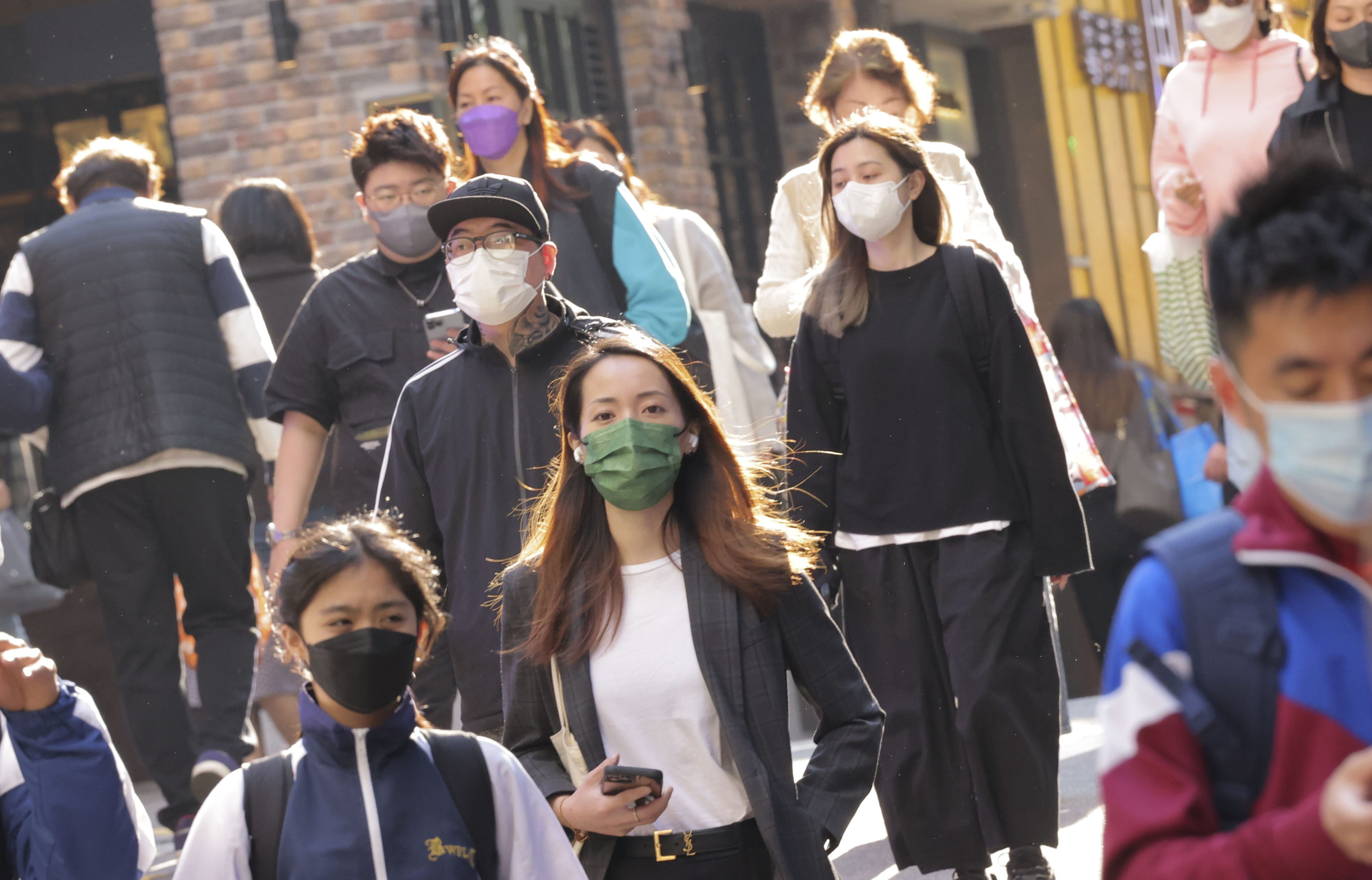 Hong Kong remains one of the few cities in the world still retaining its mask mandate. Photo: Jelly Tse