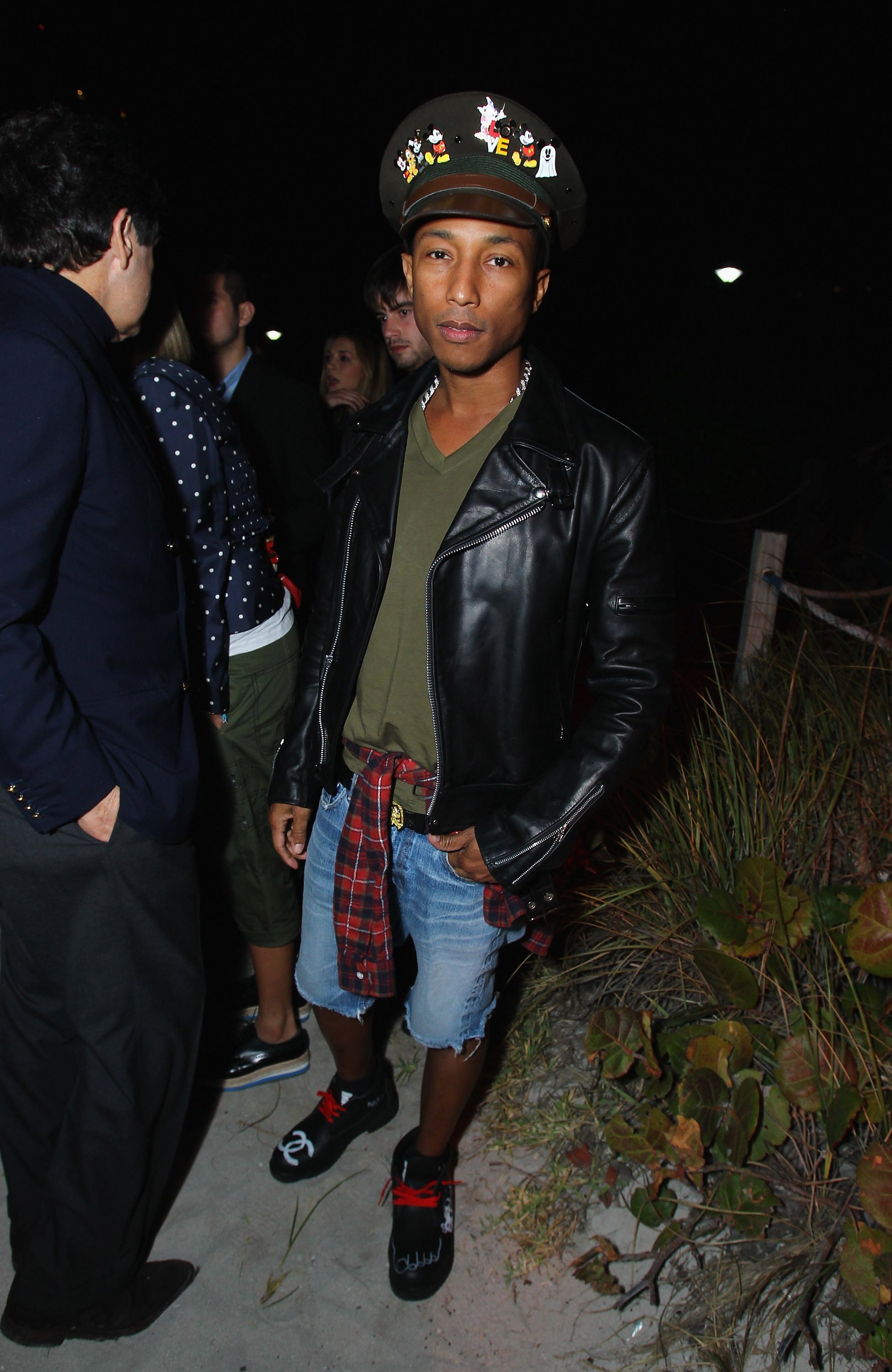 9 of Pharrell Williams' boldest fashion moments: Louis Vuitton's new  menswear creative director wore Nike boots at Cannes, a reflective Adidas  suit at the Grammys, and a purple Hermès Birkin in NYC