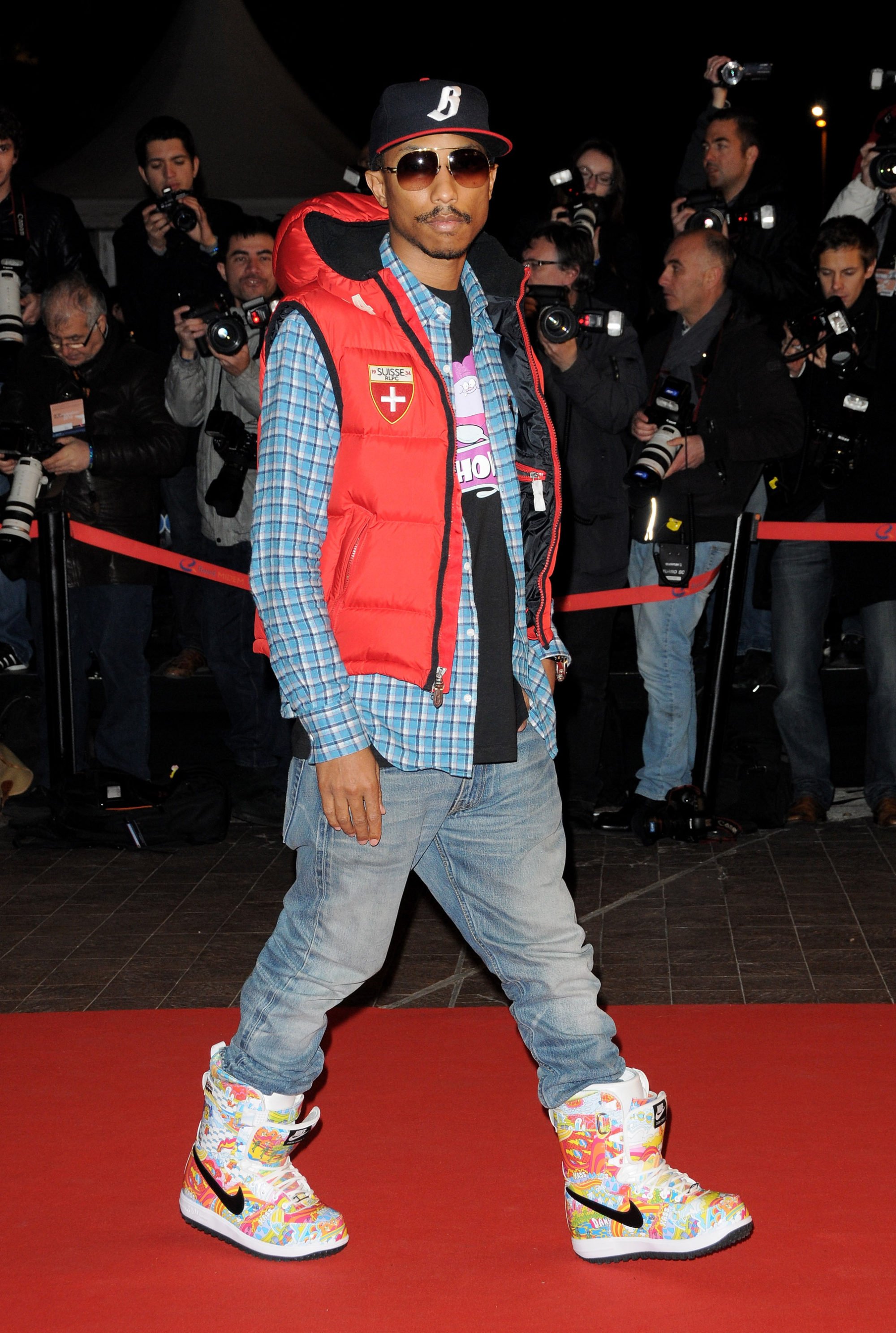 7 of Pharrell Williams' most iconic fashion moments: from his rare purple  Hermès Birkin to a reflective Adidas suit, diamond Tiffany & Co. sunglasses  – and that vintage Vivienne Westwood hat