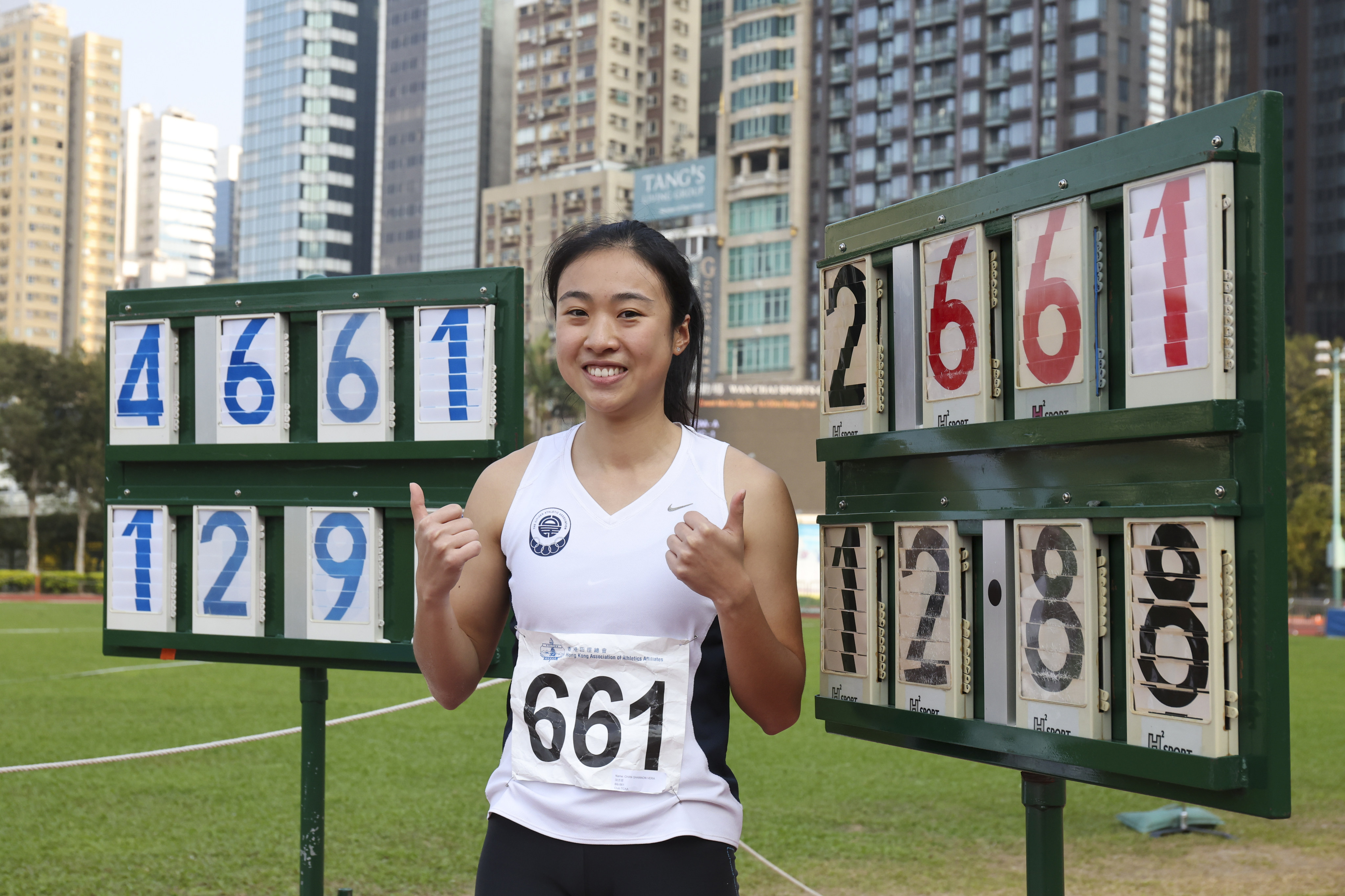 Shannon Chan celebrates her triple jump record at Wan Chai Sports Ground. Photo: Edmond So