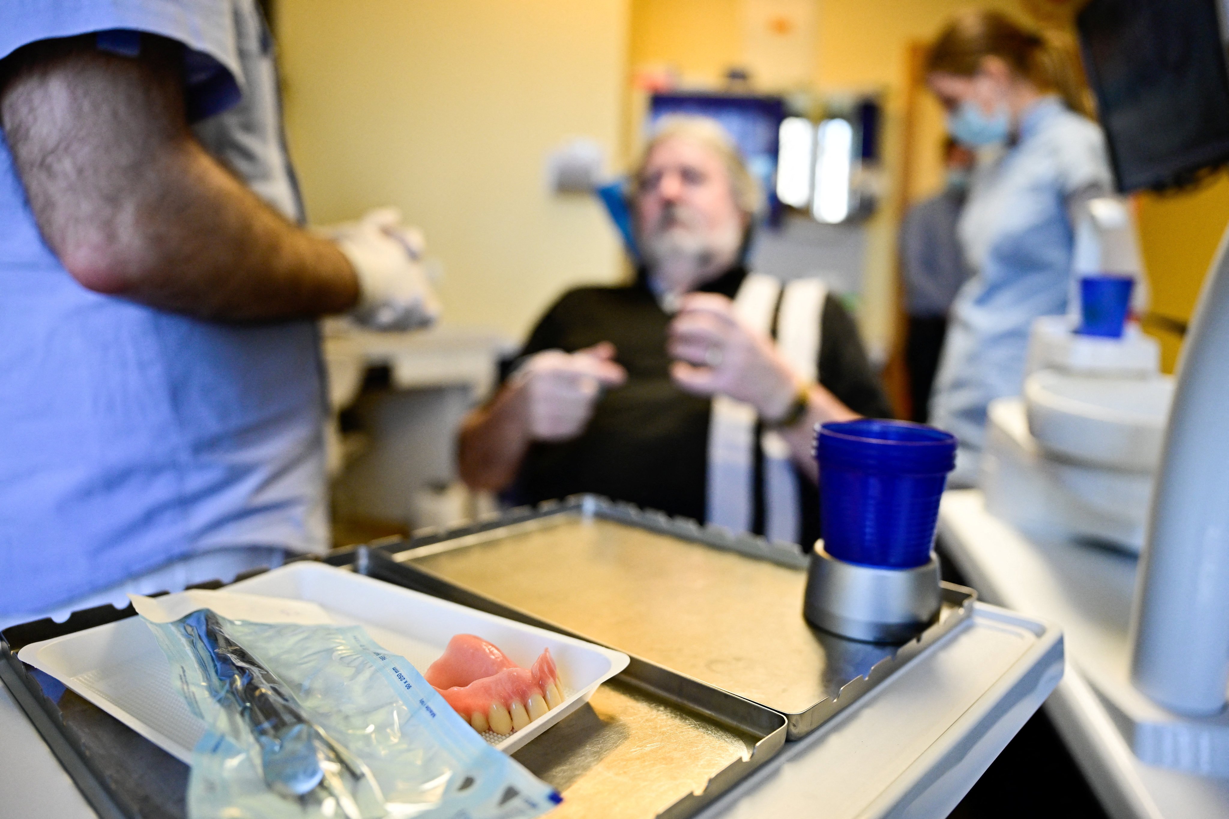 A British patient talks with a dentist during a check-up in Budapest. Photo: Reuters