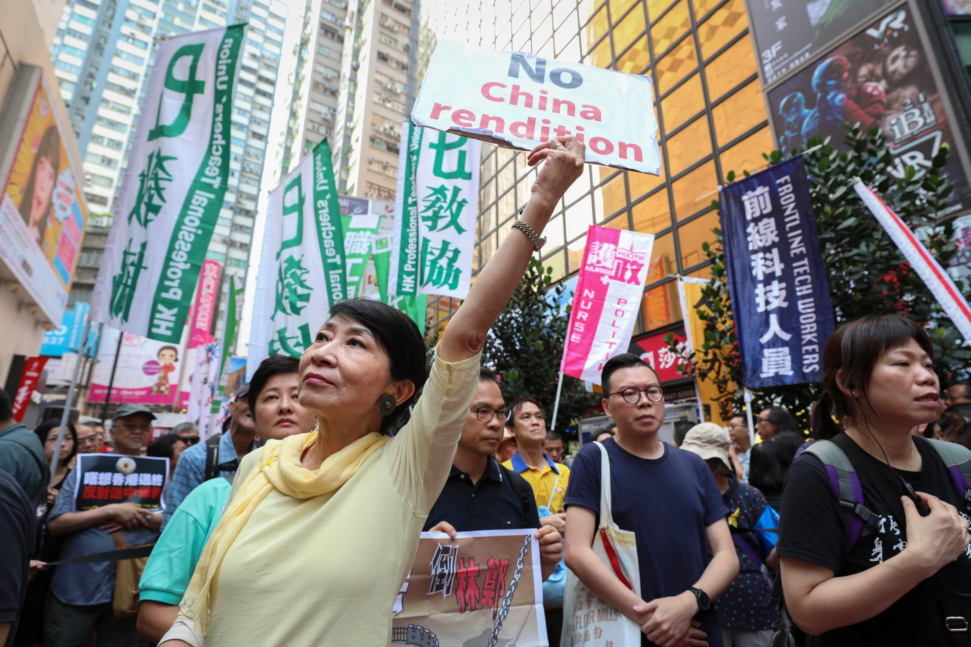 British politicians have called for the release of ex-Hong Kong lawmaker Claudia Mo (centre) on compassionate grounds. Photo: James Wendlinger