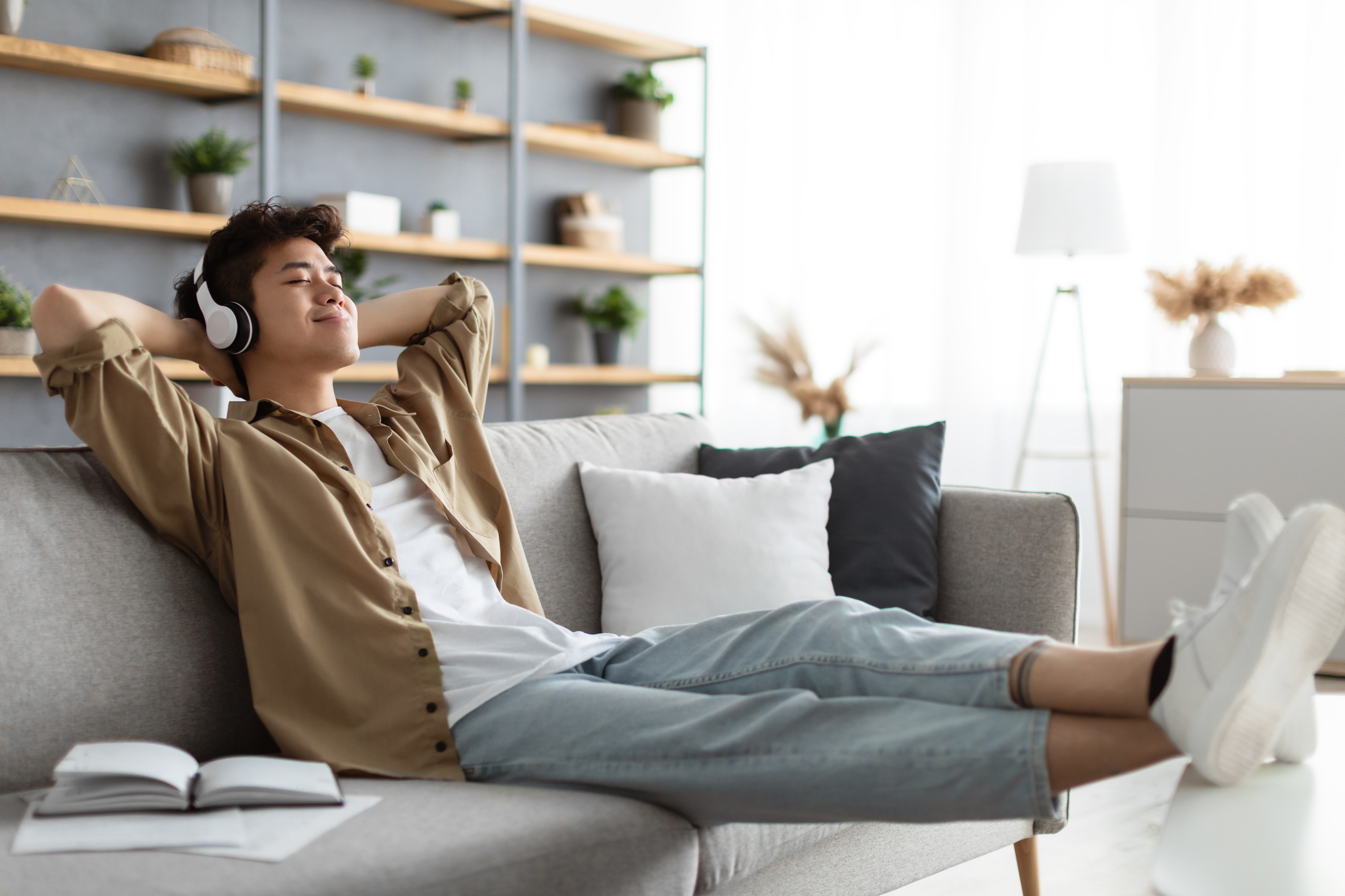 Using headphones that go over your ears rather than earbuds that are inserted in the ears may help safeguard your hearing. Above all, don’t play your music too loud, says an expert on hearing loss, a growing global problem that can have other health impacts. Photo: Shutterstock