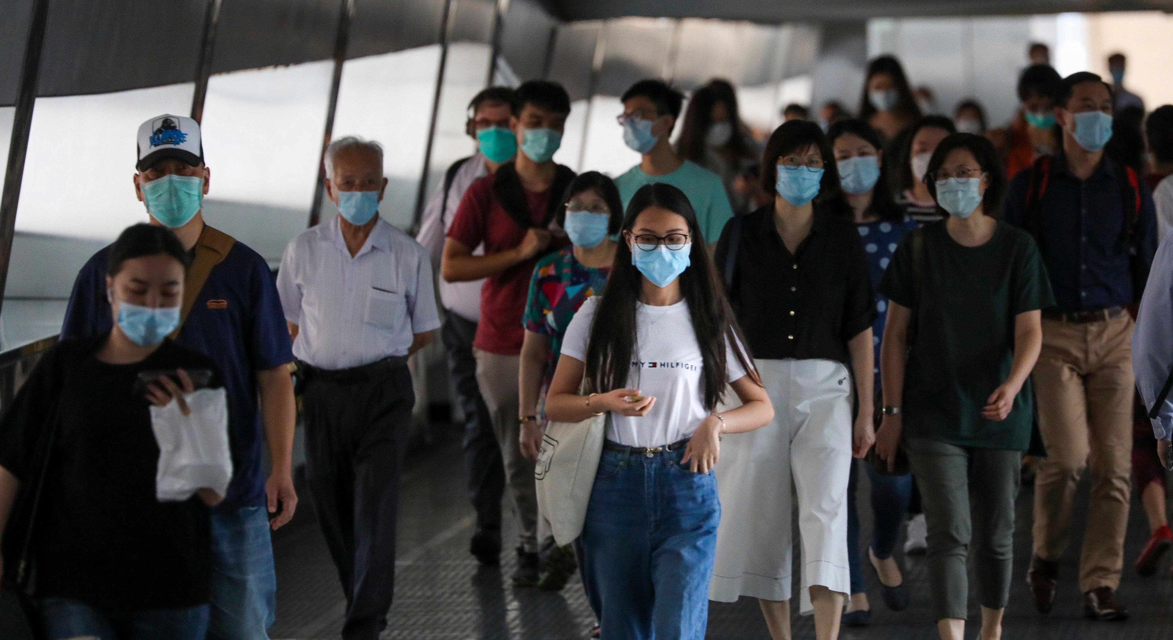 People walking in Central, Hong Kong, in July 2020. While Hongkongers are well dressed, there is no individuality, says Kate Whitehead. Photo: SCMP