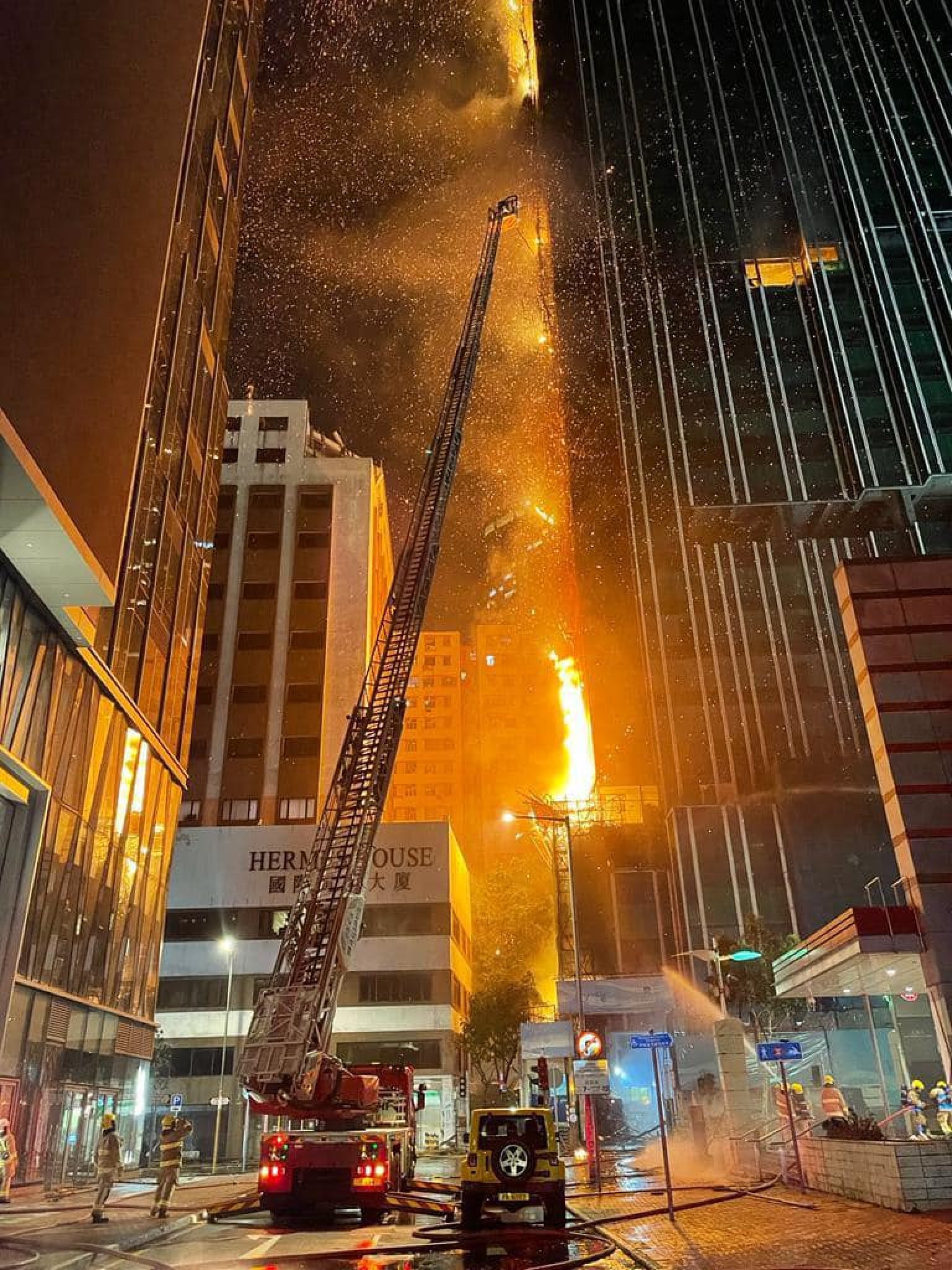 A turntable ladder at the scene of a major fire at an under-construction hotel in Tsim Sha Tsui.on Thursday night. Photo: Handout