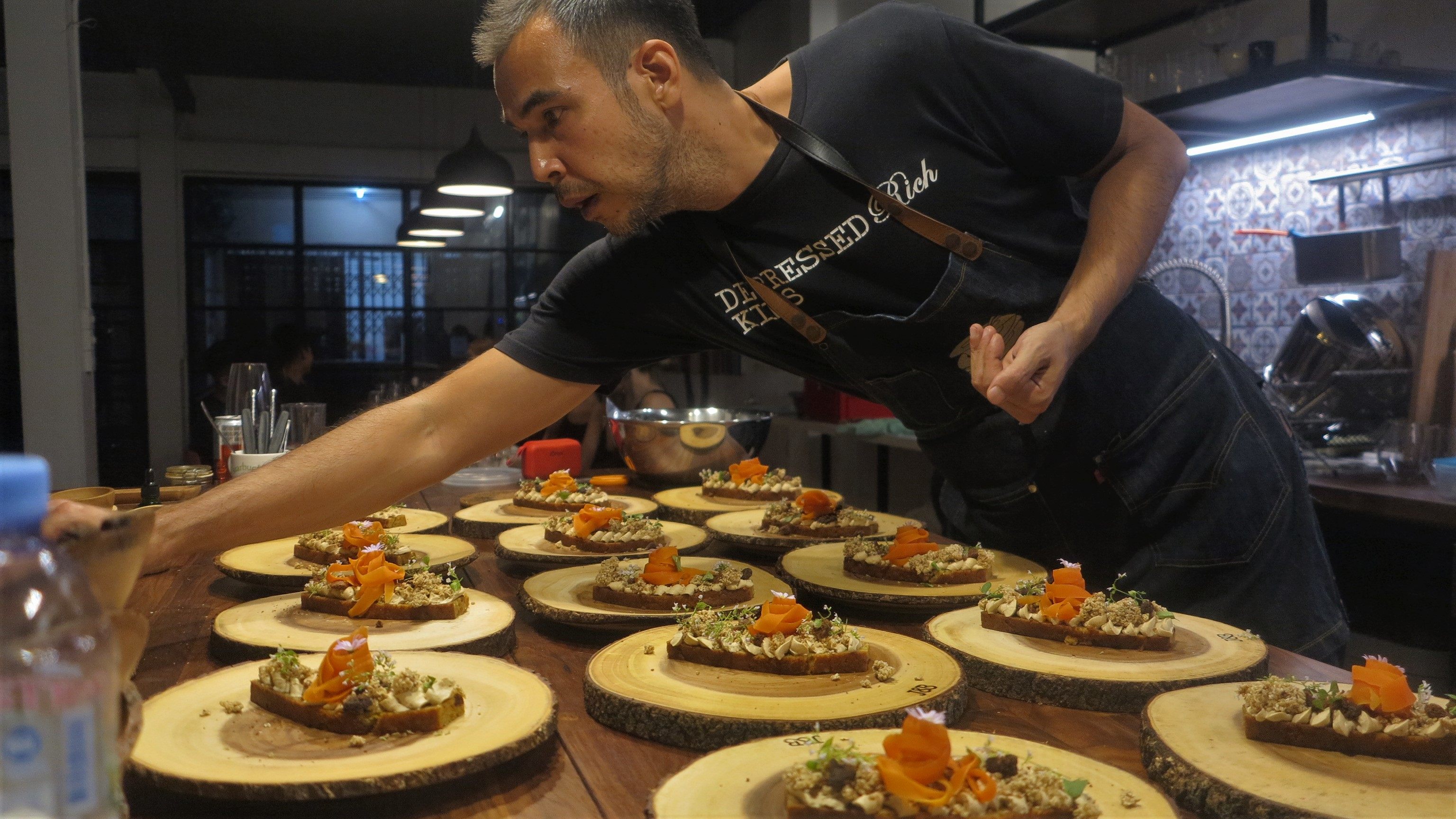 Chef Steven John prepares dishes flavoured with cannabis for a private dinner in Bangkok, Thailand. Photo: Empty Plates