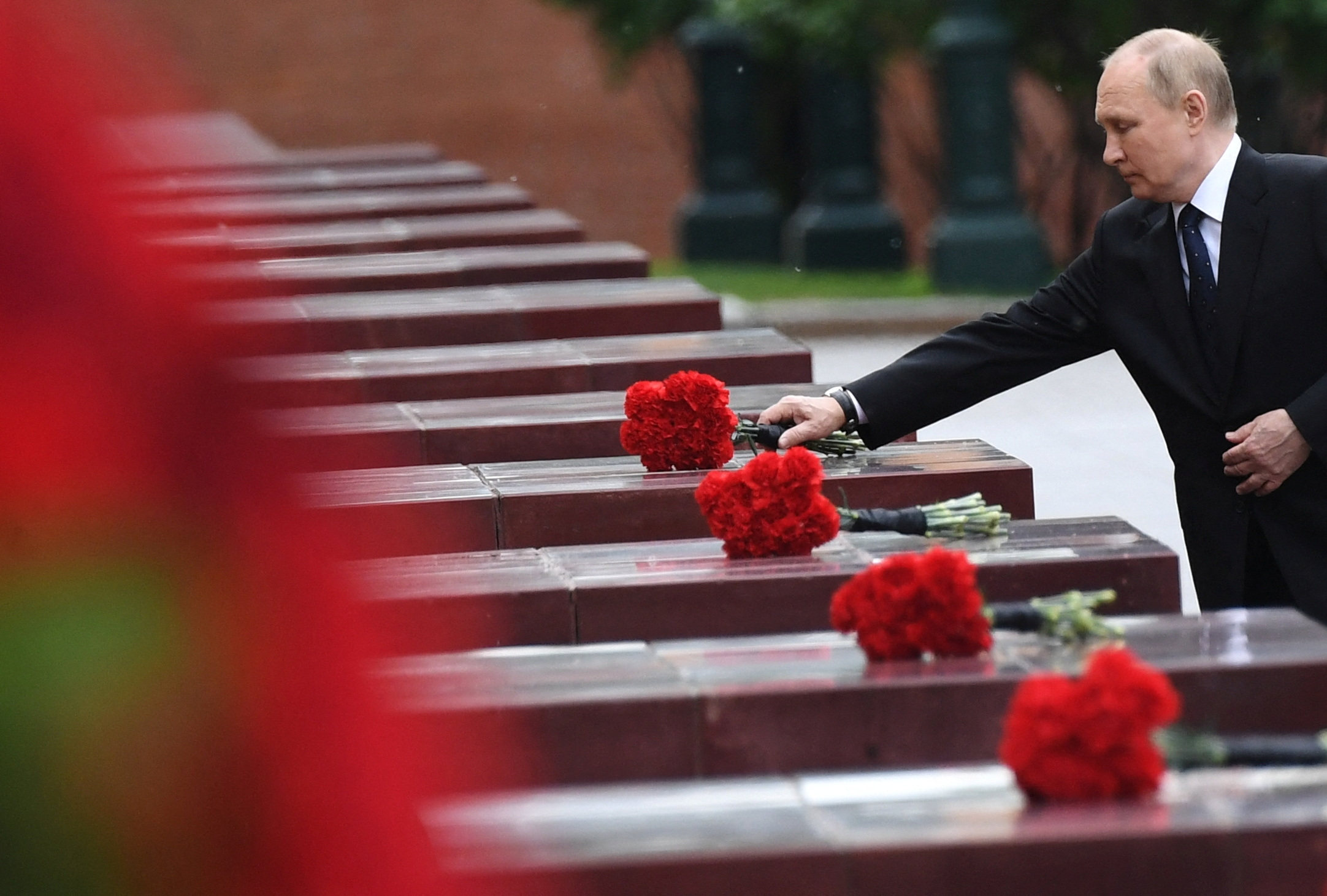 Russian President Vladimir Putin lays flowers at a memorial to the Hero Cities during a ceremony to mark the anniversary of the beginning of the so-called Great Patriotic War against Nazi Germany in 1941, in central Moscow, Russia, on June 22. Photo: Sputnik / Kremlin via Reuters