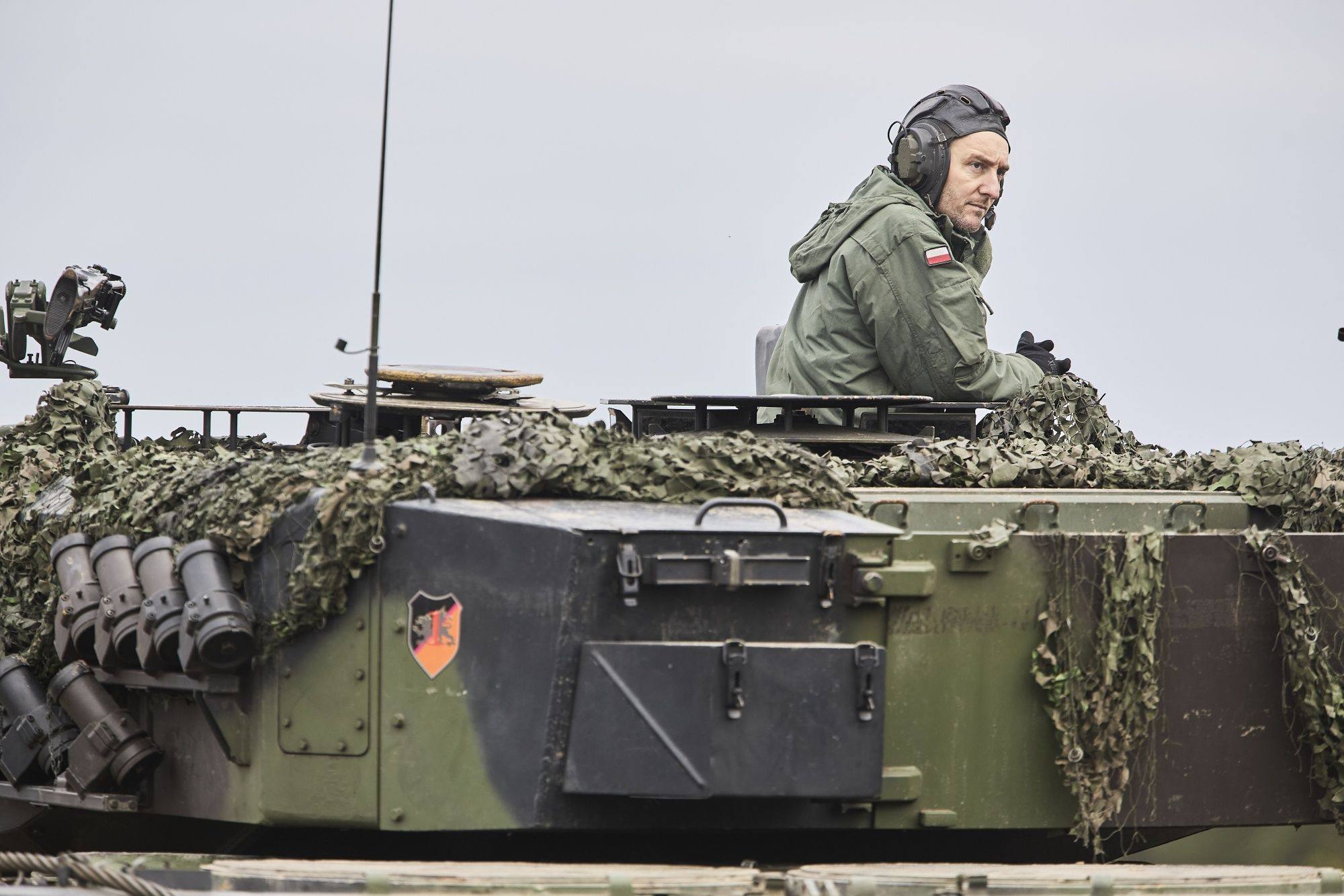 A Ukrainian army soldier, wearing Polish army uniform, in a Leopard 2 A4 tank during an exercise at the Swietoszow Tank Training Center in Swietoszow, Poland, in February 2023. Photo: Bloomberg