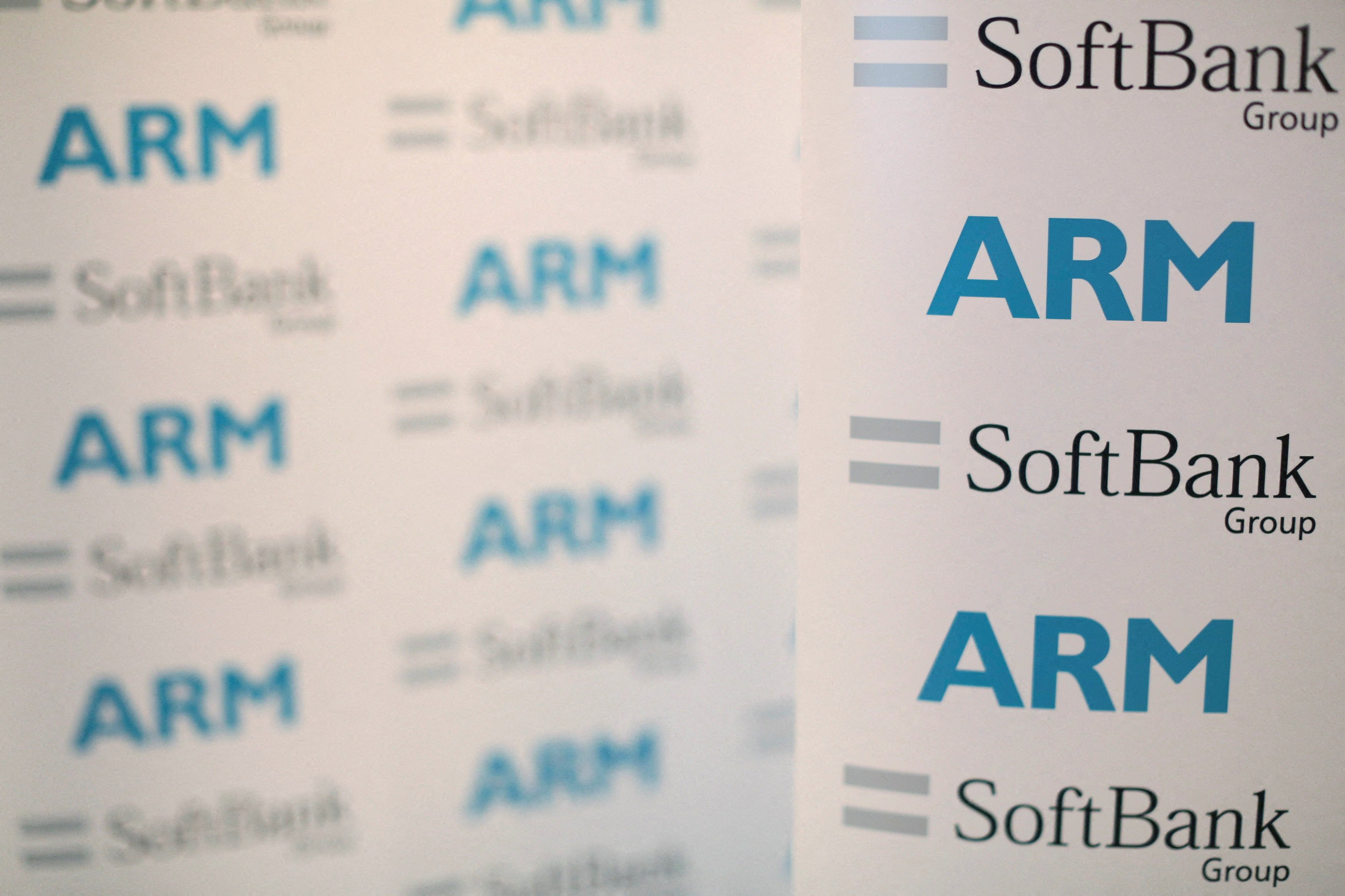 An Arm and SoftBank Group Corp-branded board is seen displayed at a news conference in London on July 18, 2016. Photo: Reuters
