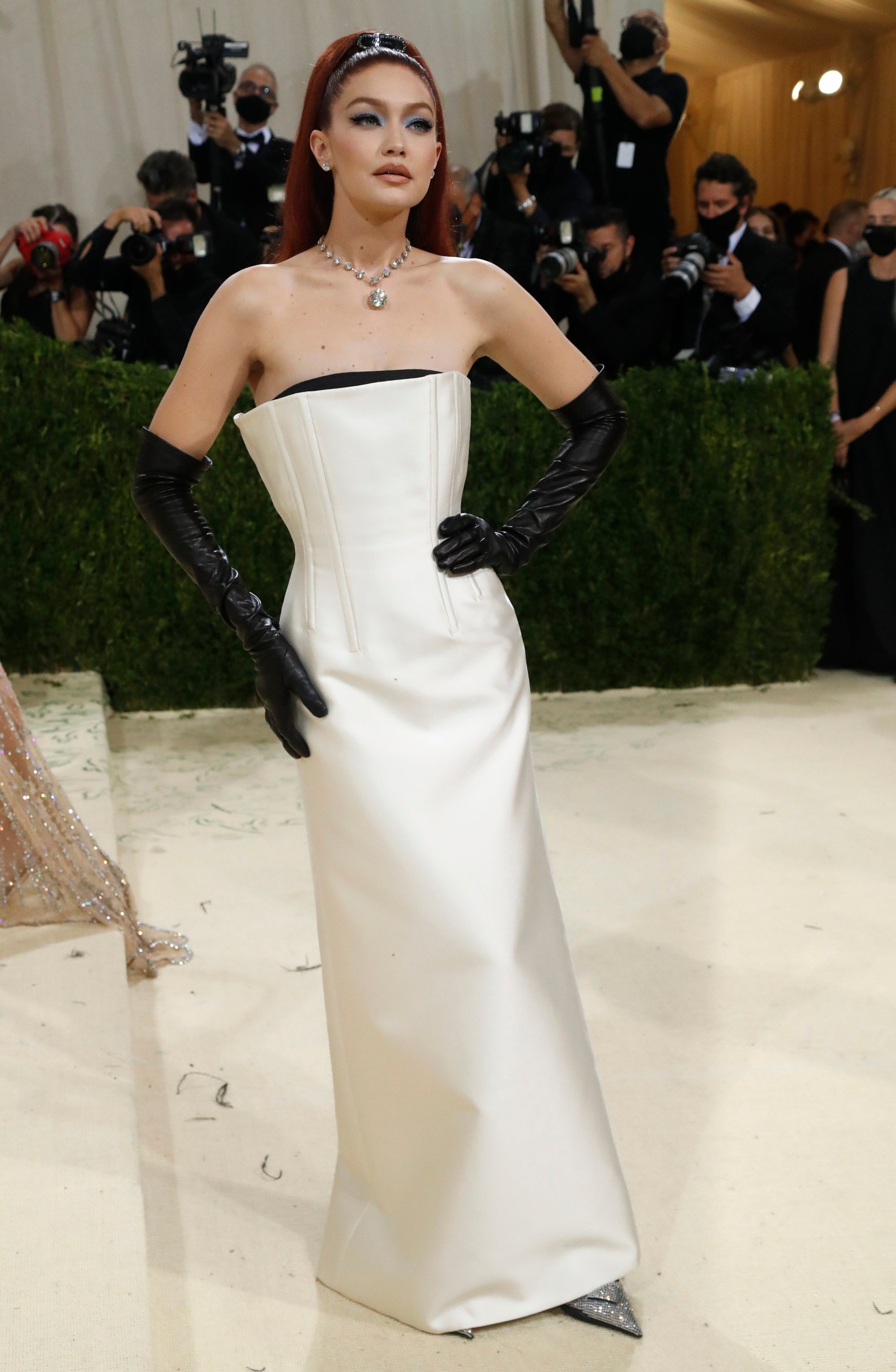 Emma Stone wears a daring thigh-split plunging gown at the Met Gala