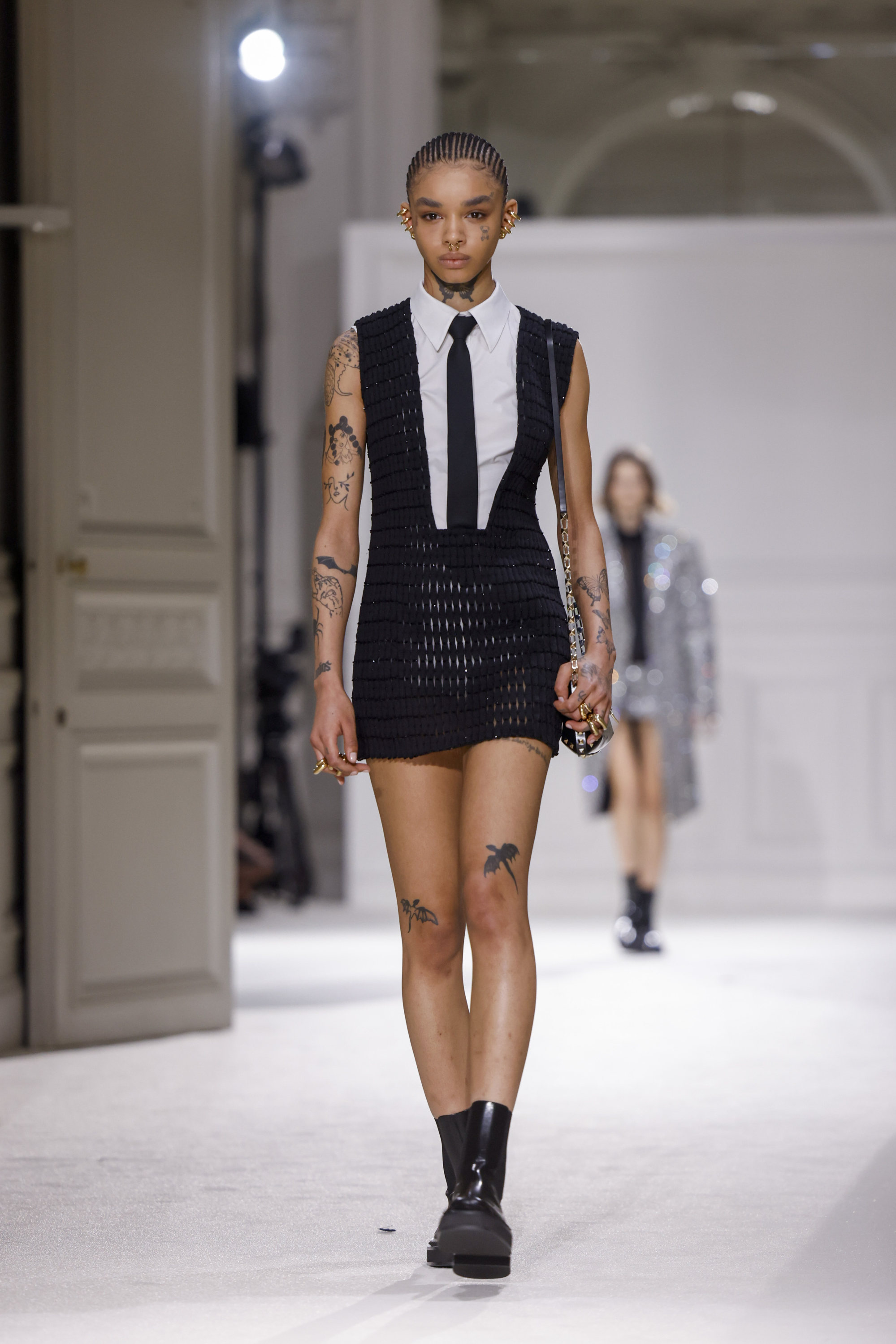 Look sharp! Shoulder pads and spikes are back as Paris calls time