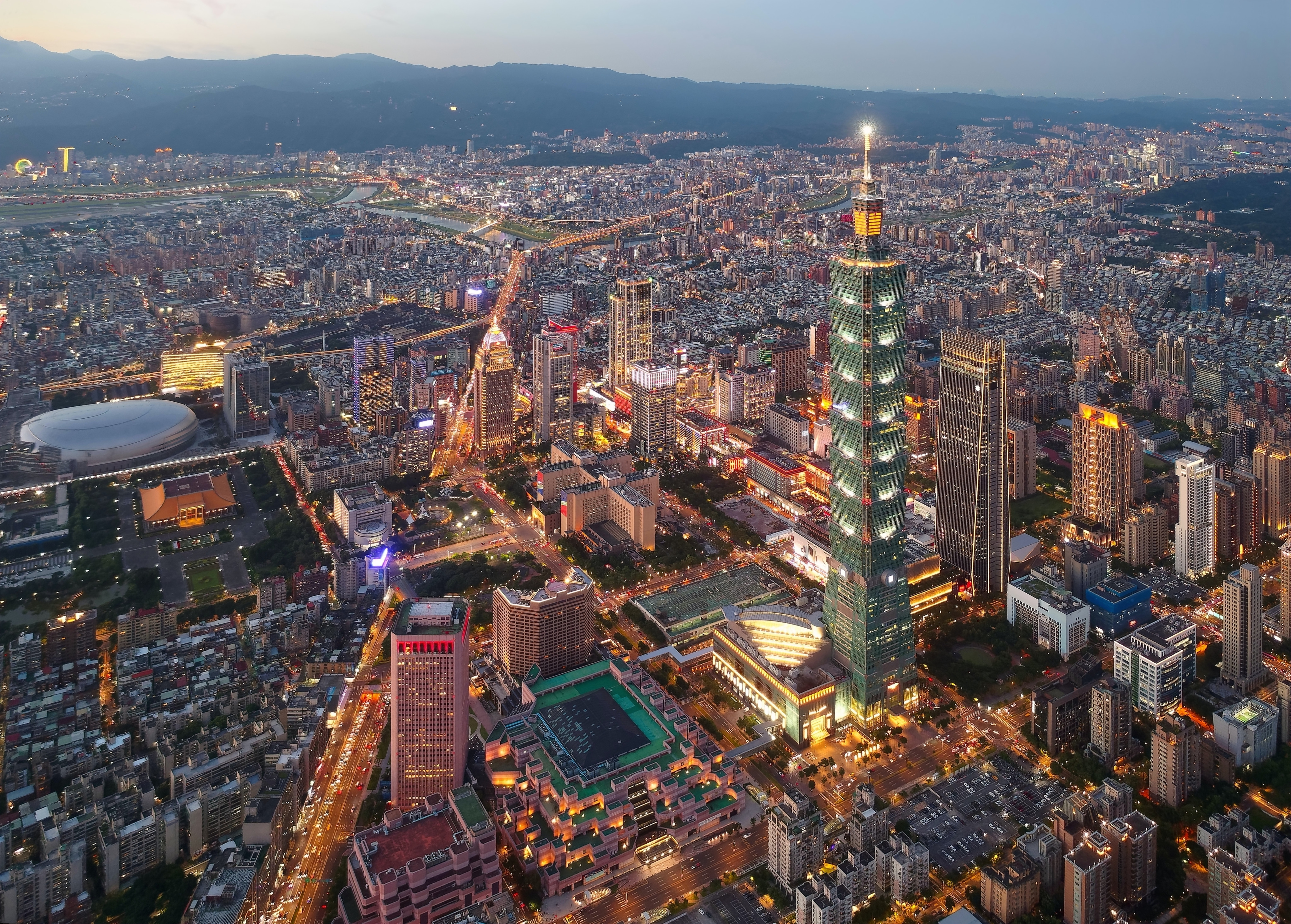 Downtown Taipei at dusk. Taiwan is wooing international visitors to its vibrant capital and other destinations with a discount card for arrivals. Other island destinations such as Sicily and Hong Kong have similar campaigns. Photo: Shutterstock