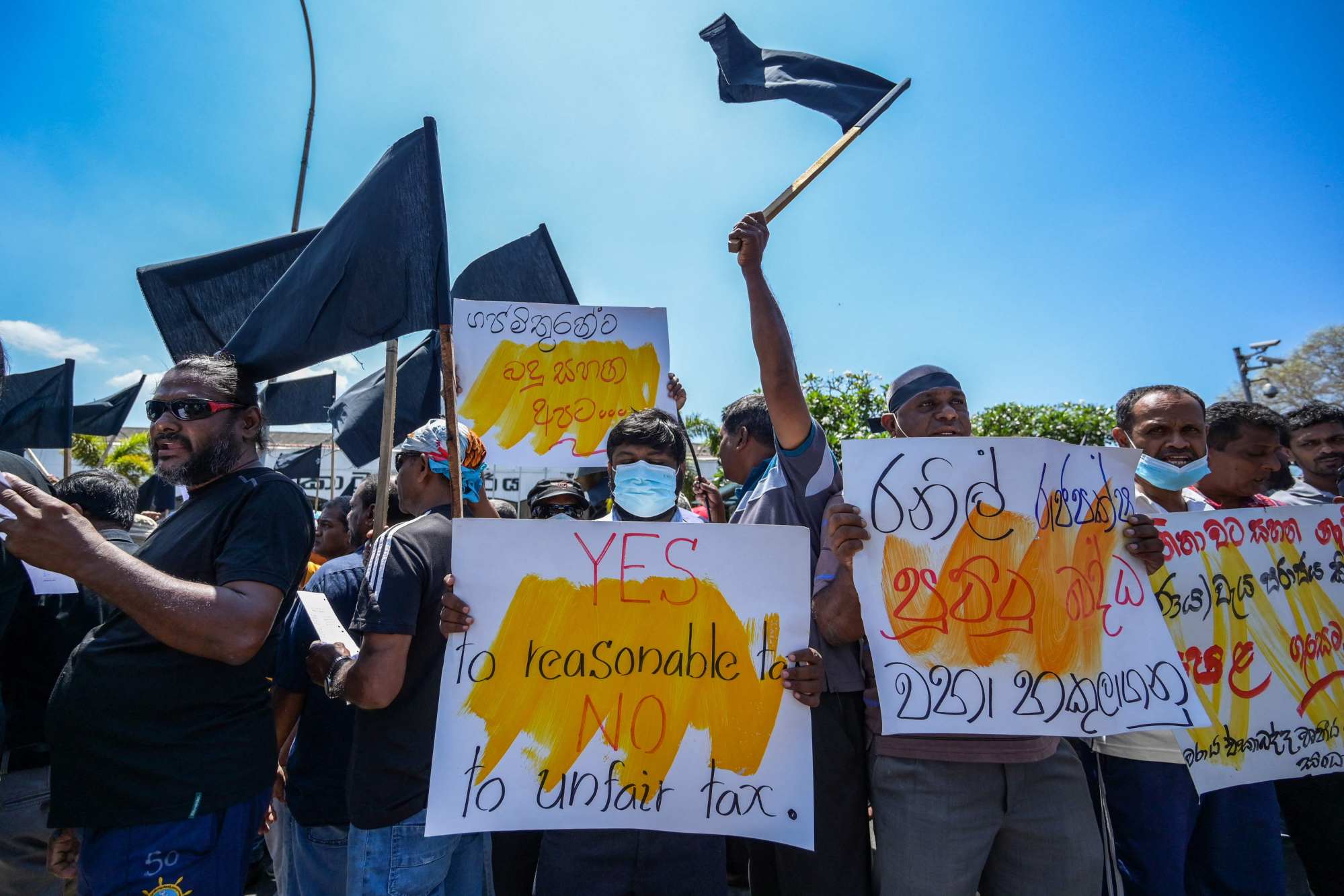 People protest over sharp increases in electricity charges and income taxes in Colombo in February 2023. Photo: AFP