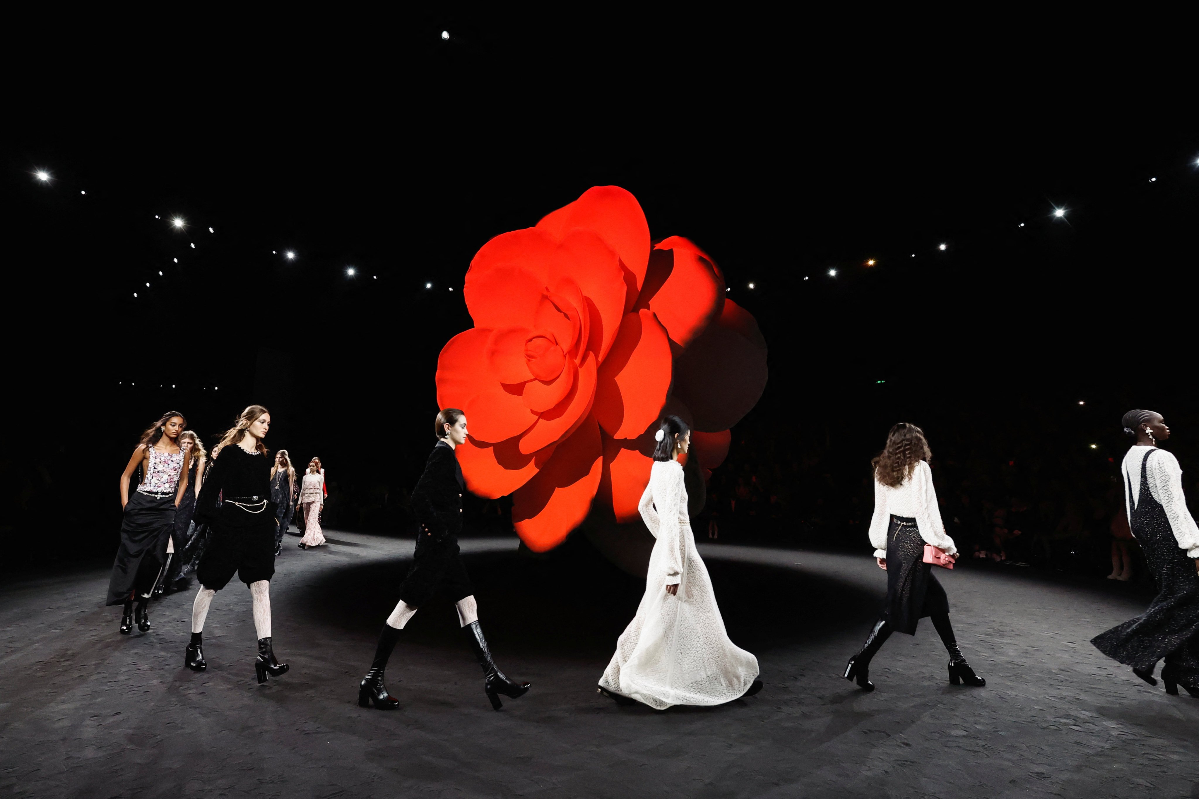 Paris Fashion Week 2023: Chanel closed out with a burst of camellia blooms,  Prada's sister brand Miu Miu disrupted the runways, and Penelope Cruz  reminisced about Karl Lagerfeld
