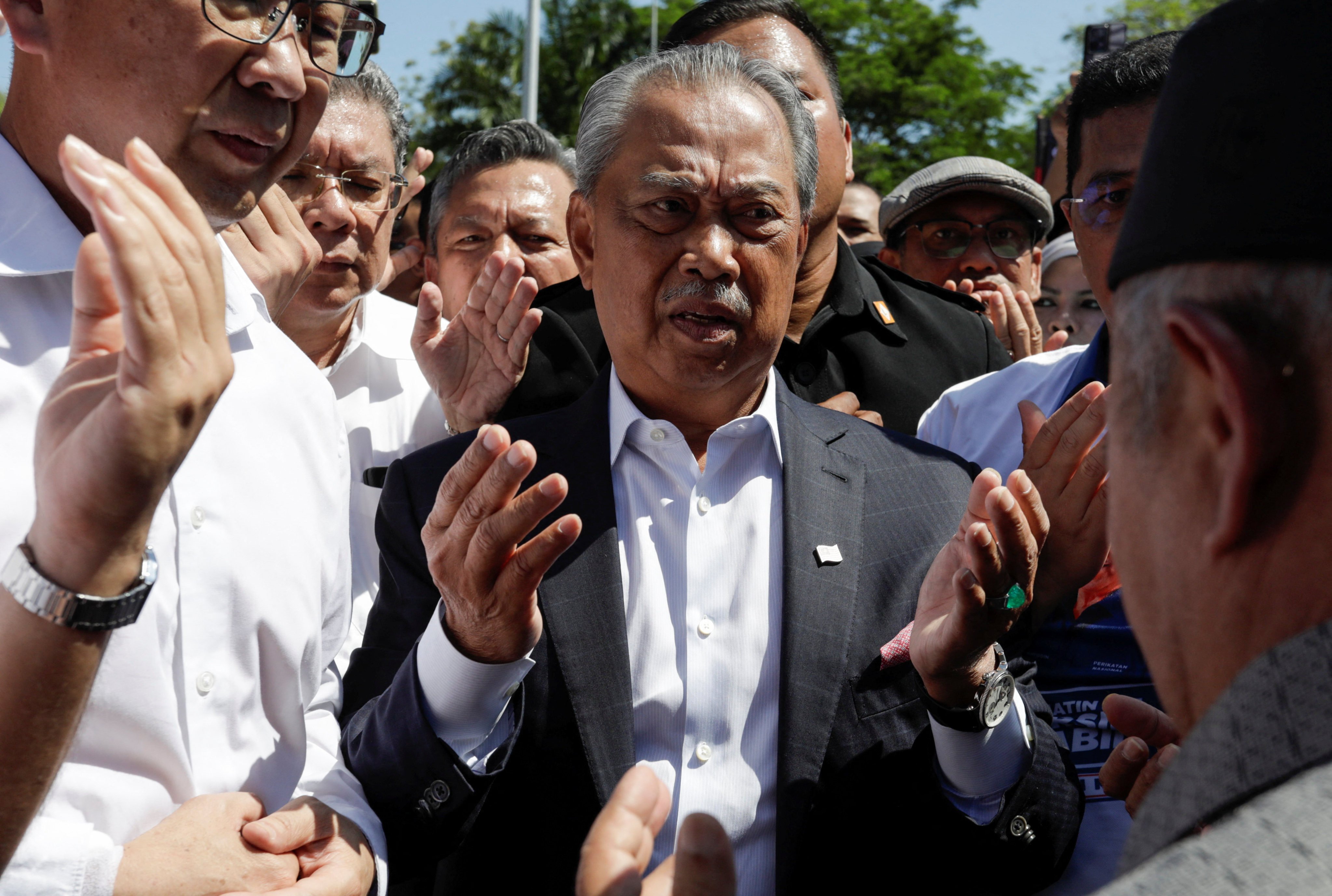 Muhyiddin Yassin arrives to give a statement to MACC on March 9, 2023. Photo: Reuters