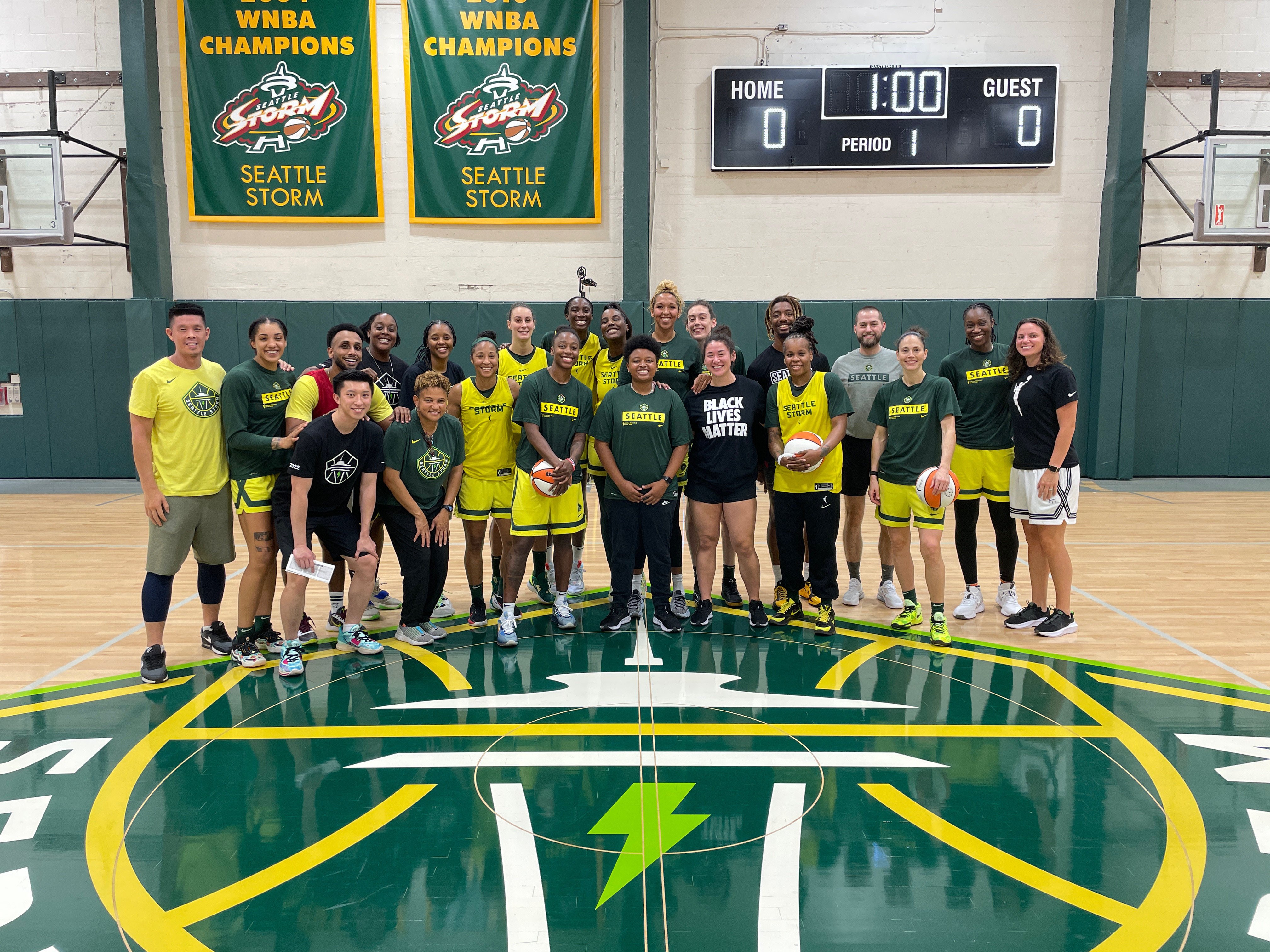 Winson Tam (first from left, front row) has been working with the Seattle Storm since last year. Photo: Winson Tam