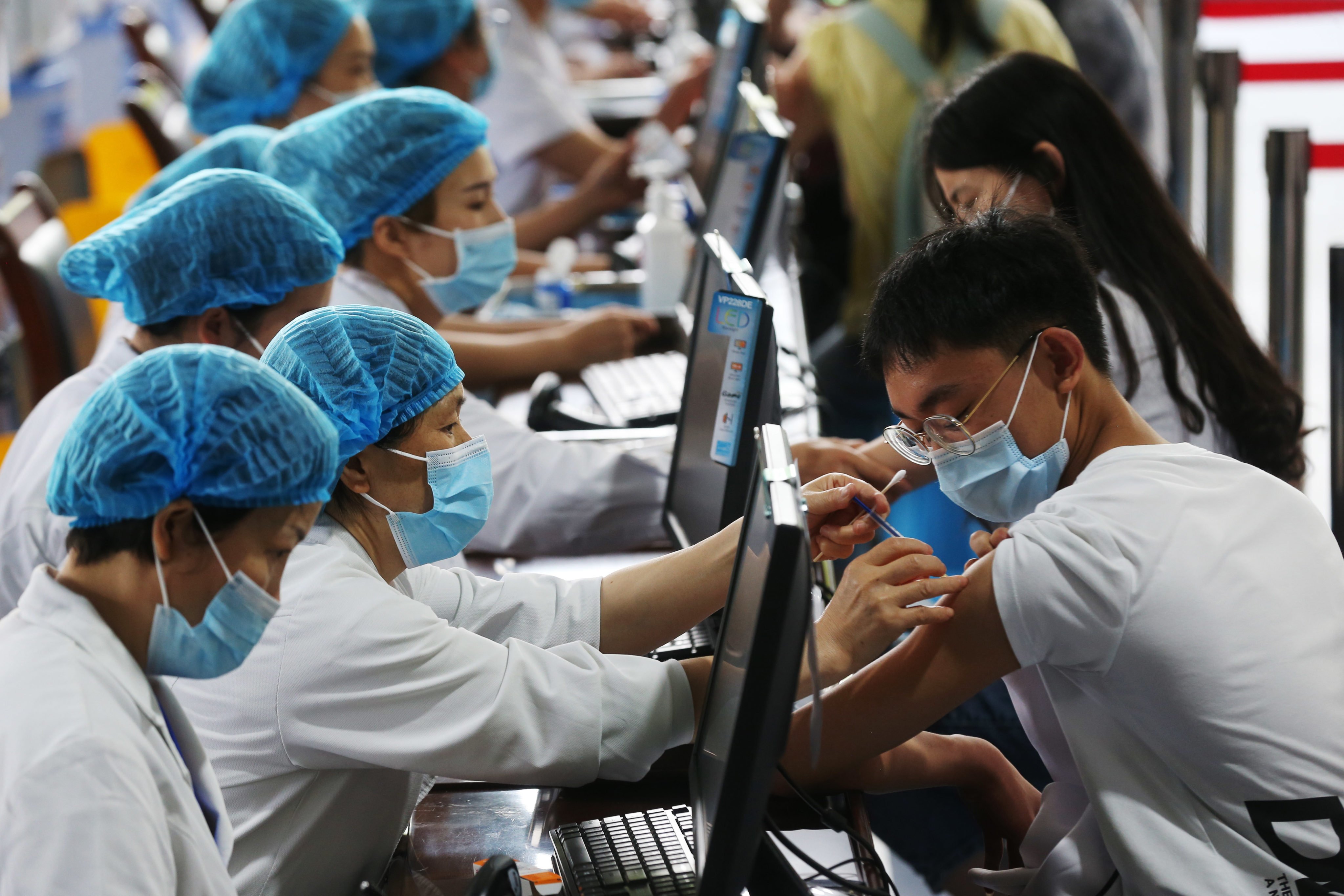 China says it spent 150 billion yuan in 2021 and 2022 buying vaccines and inoculating its population. Photo: DPA