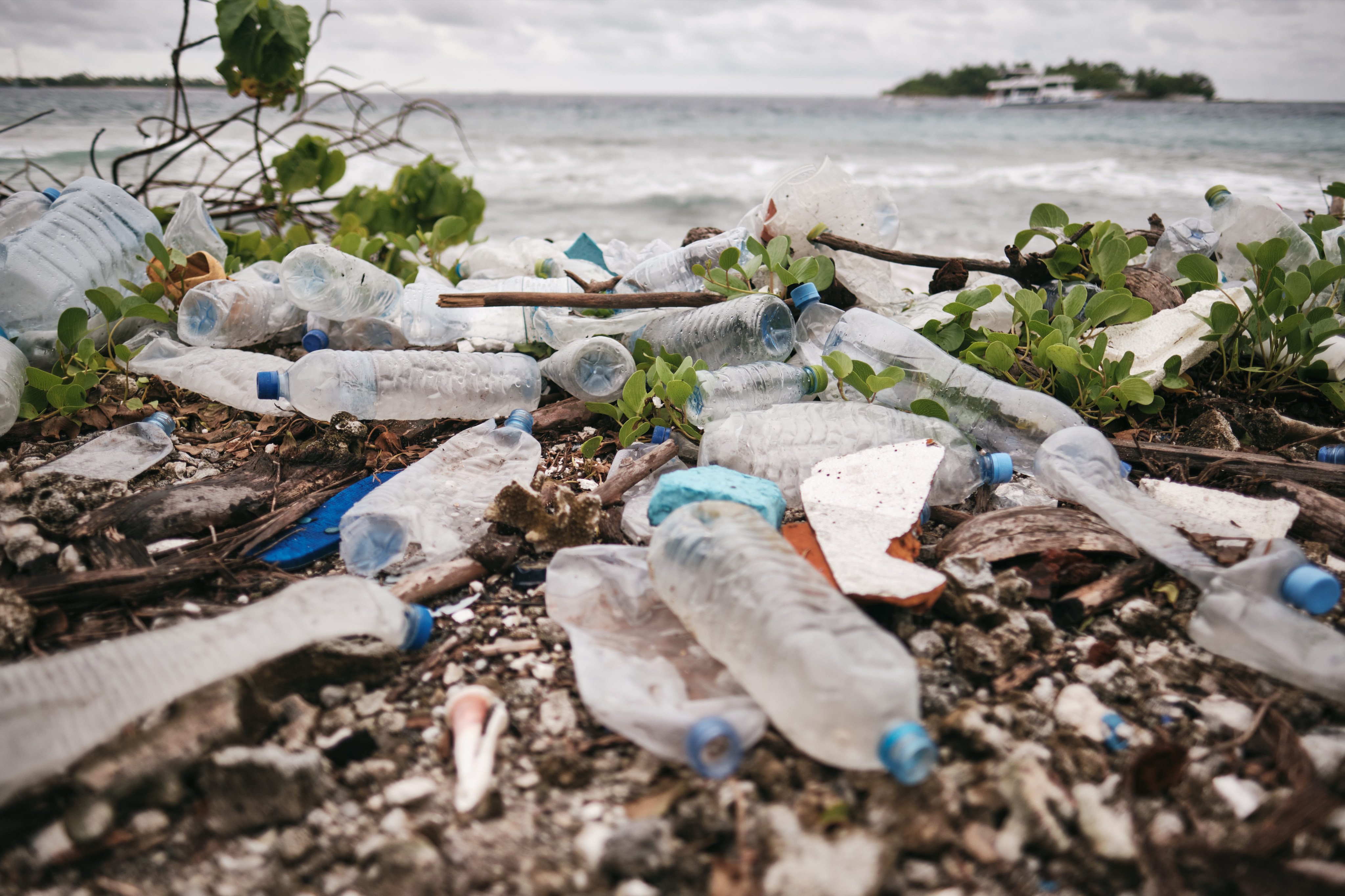 Plastic bottles and rubbish on the beach on Lammu, in the Maldives. One luxury holiday resort in the nation is turning plastic rubbish from its regular beach clean-ups into useful treasure. Photo: Getty Images