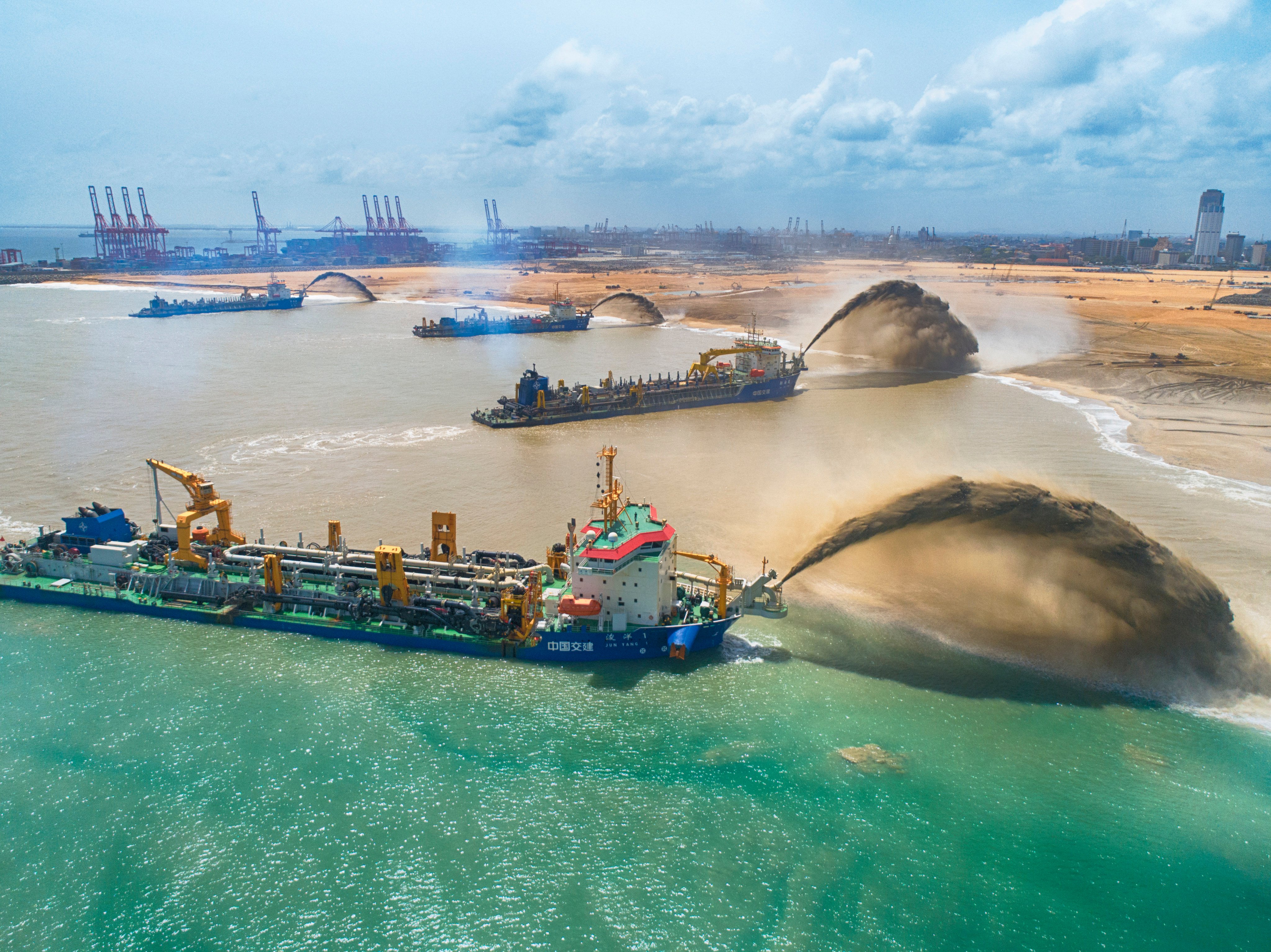 Chinese dredgers work at the construction site of the Colombo Port City project in Sri Lanka. China has invested heavily in its dredging industry and has built about 200 vessels since 2006. Photo: Xinhua