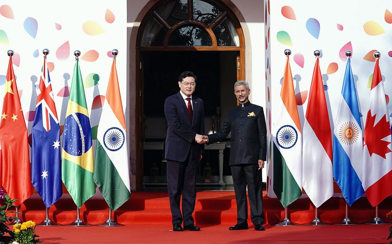Indian foreign minister S. Jaishankar welcomes his Chinese counterpart Qin Gang to the G20 meeting in New Delhi on March 2. China refused to sign a joint communique condemning Russia’s war. Photo: Handout/EPA-EFE