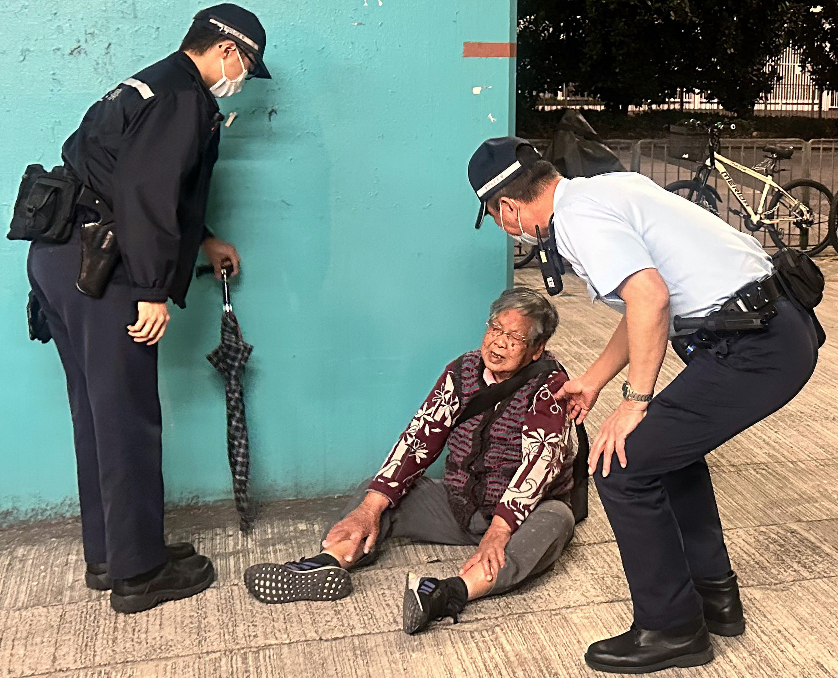 A 90-year-old licensed street hawker Chan Tak-ching had her roast chestnut trolley confiscated after being accused of asking a relative, a non-license holder, to look after her belongings temporarily while she was away for a toilet break. Photo: SCMP/ Natalie Wong