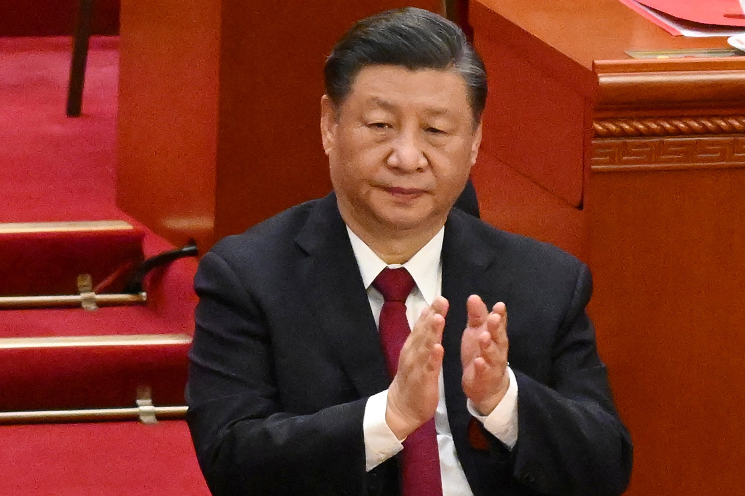 China’s President Xi Jinping applauds during the closing session of the National People’s Congress (NPC) at the Great Hall of the People in Beijing. Photo: Reuters