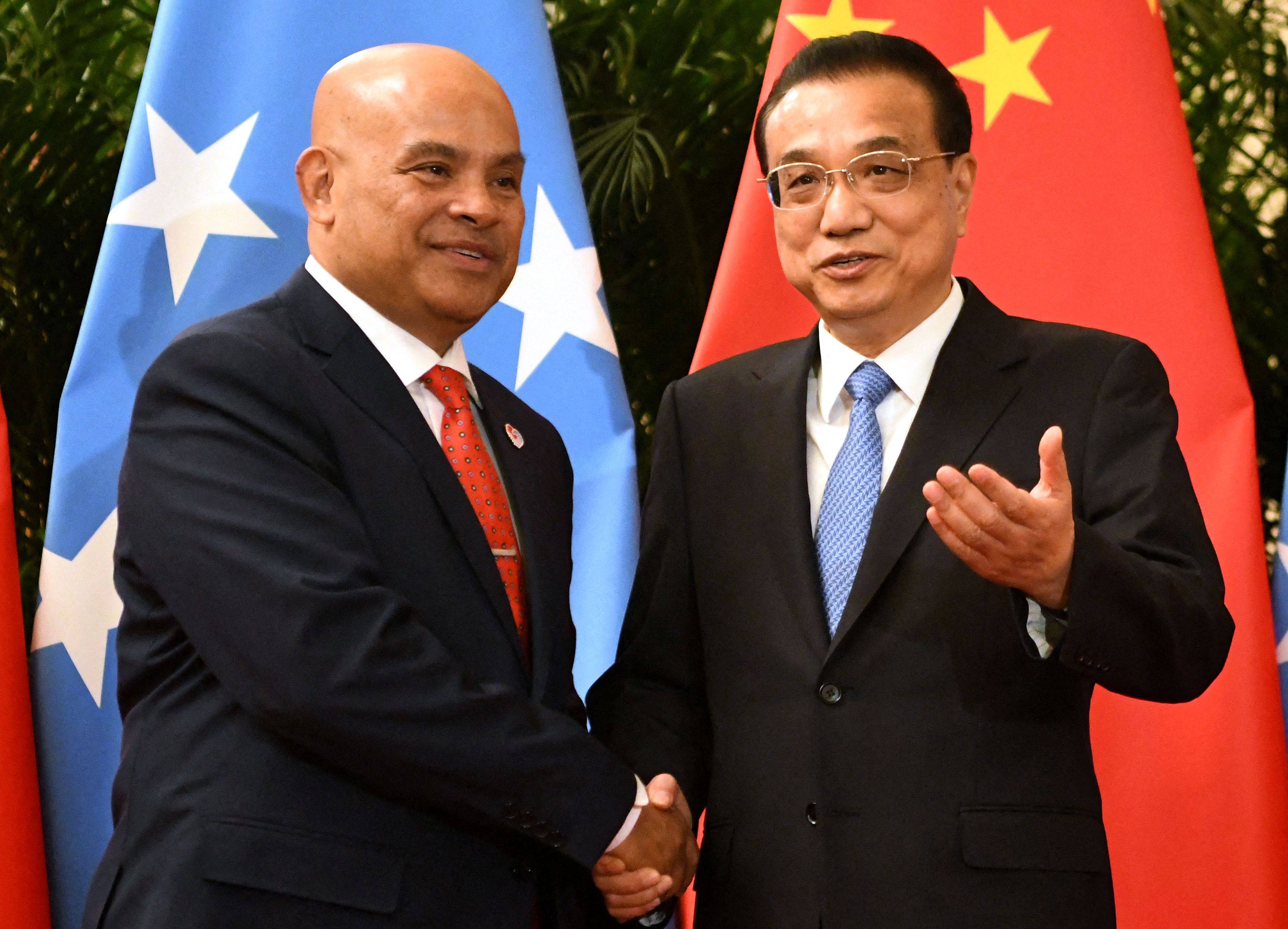 Micronesia’s President David Panuelo shakes hands with China’s former Premier Li Keqiang at the Great Hall of the People in Beijing in 2019. Photo: AFP