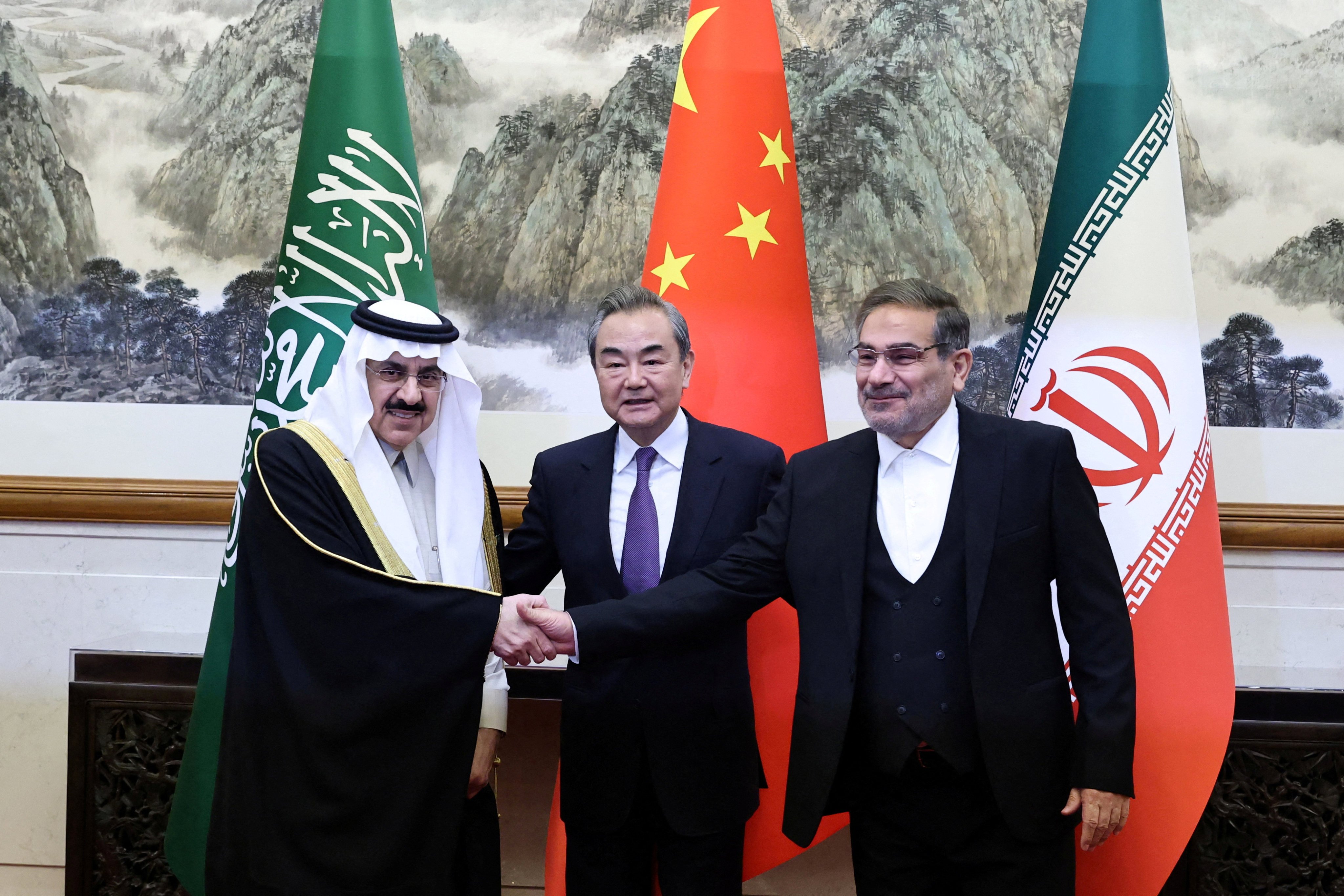 China’s top diplomat Wang Yi (centre) with Ali Shamkhani (right), secretary of Iran’s Supreme National Security Council, and Saudi Arabian national security adviser Musaad bin Mohammed al-Aiban in Beijing on Friday. Photo: Reuters