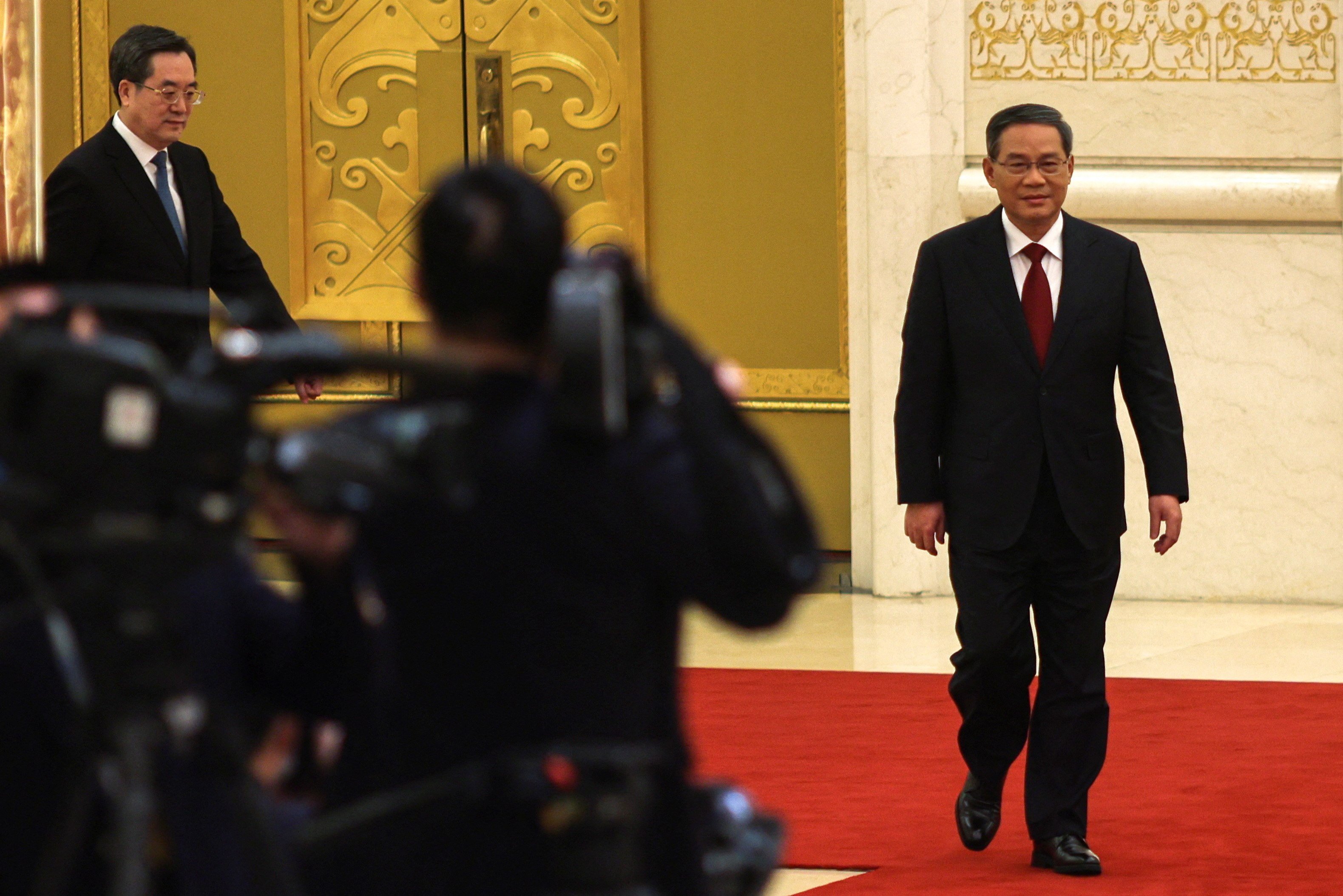 New Chinese Vice-Premier Ding Xuexiang (left) after the closing session of the National People’s Congress in the Great Hall of the People, Beijing. Photo: EPA-EFE