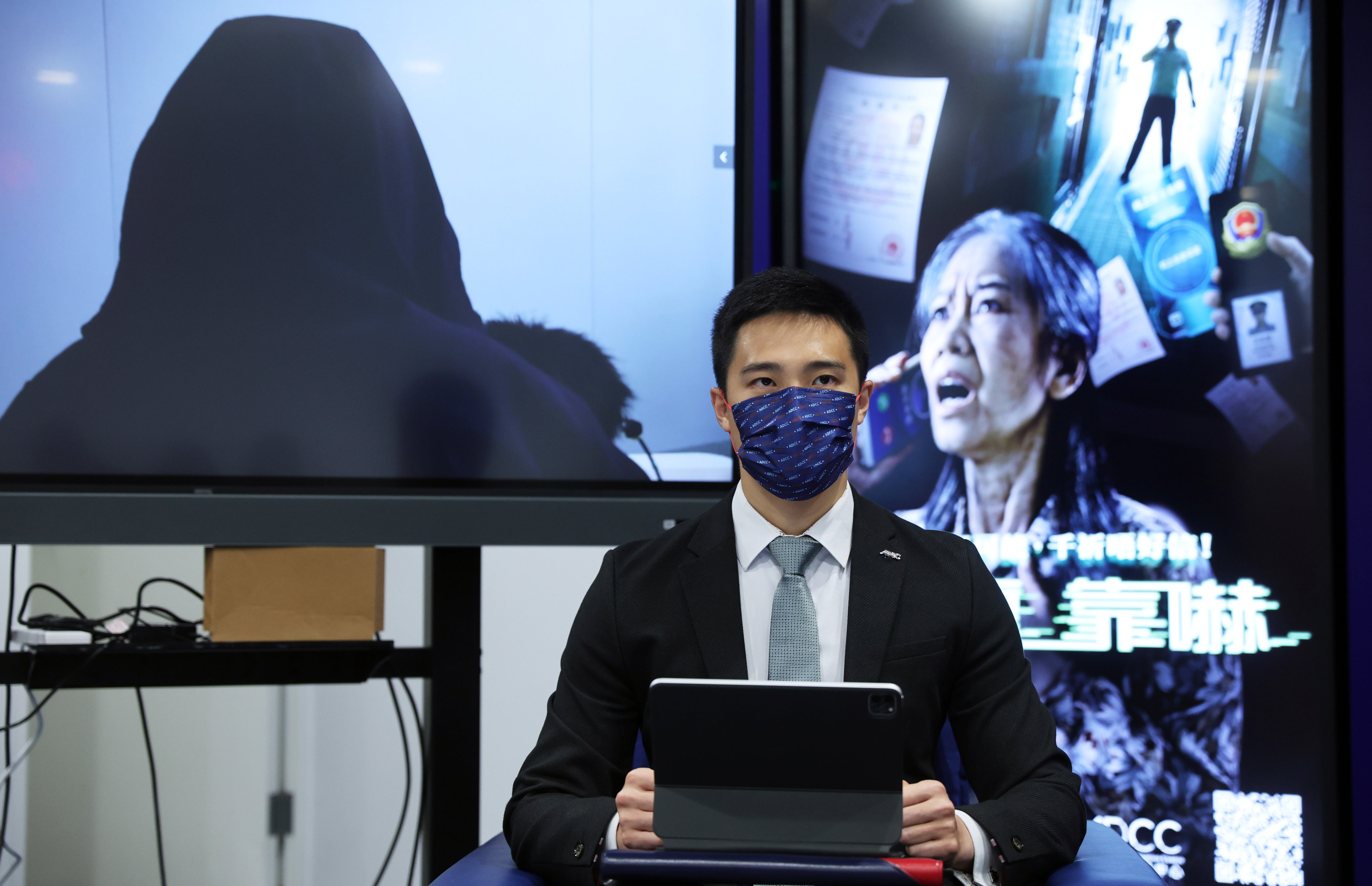 A scam victim shares her story via a phone-in at a press conference hosted by the Anti-Deception Coordination Centre of the Hong Kong police, at the police headquarters in Wan Chai on October 24 last year. Photo: Edmond So